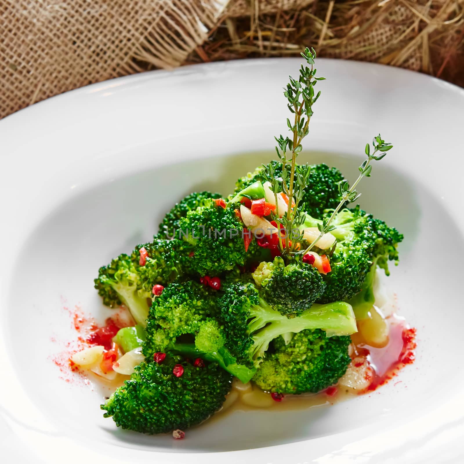 boiled broccoli in white bowl  by sarymsakov