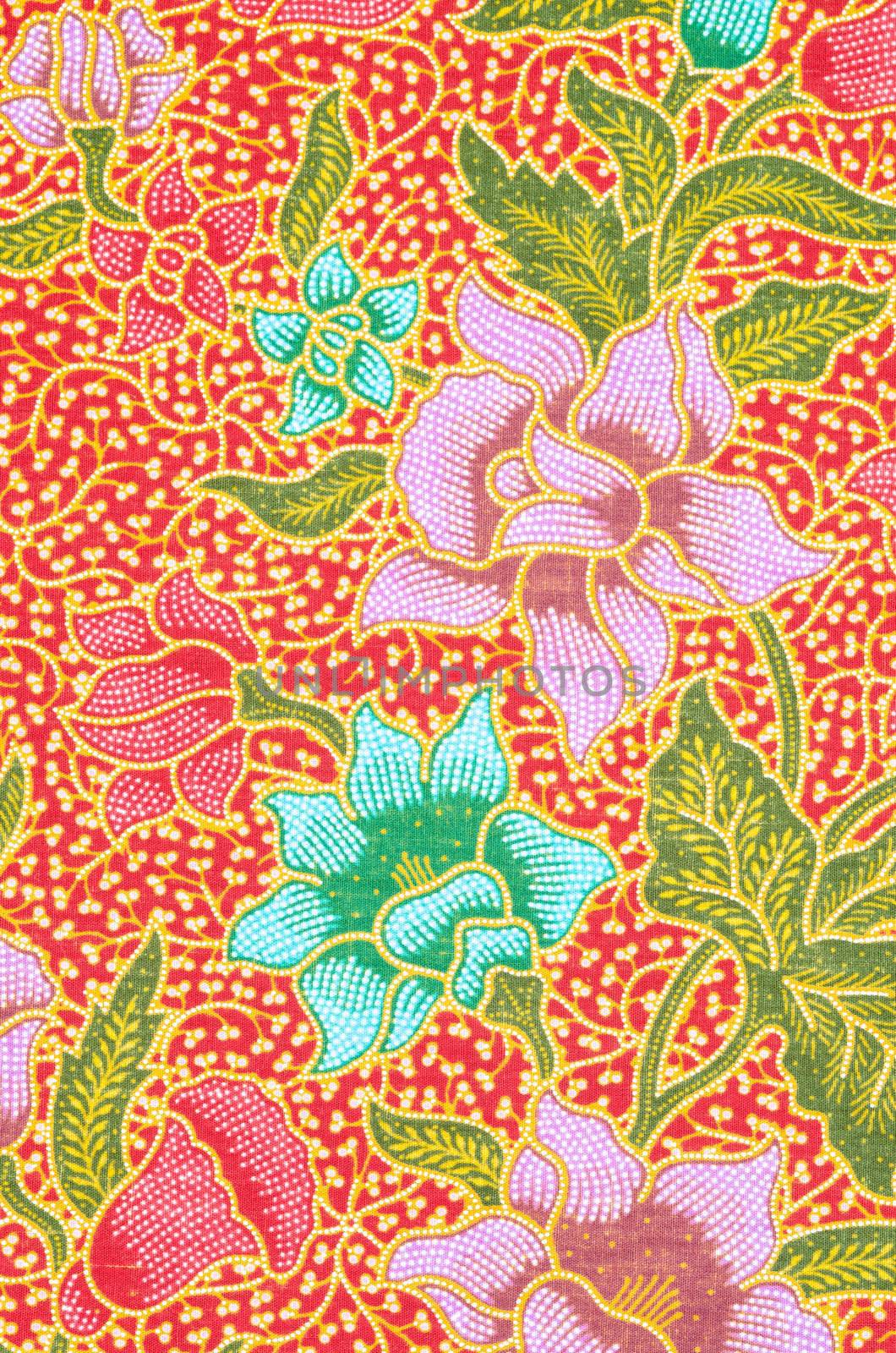 flower pattern background on batik fabric thai style.