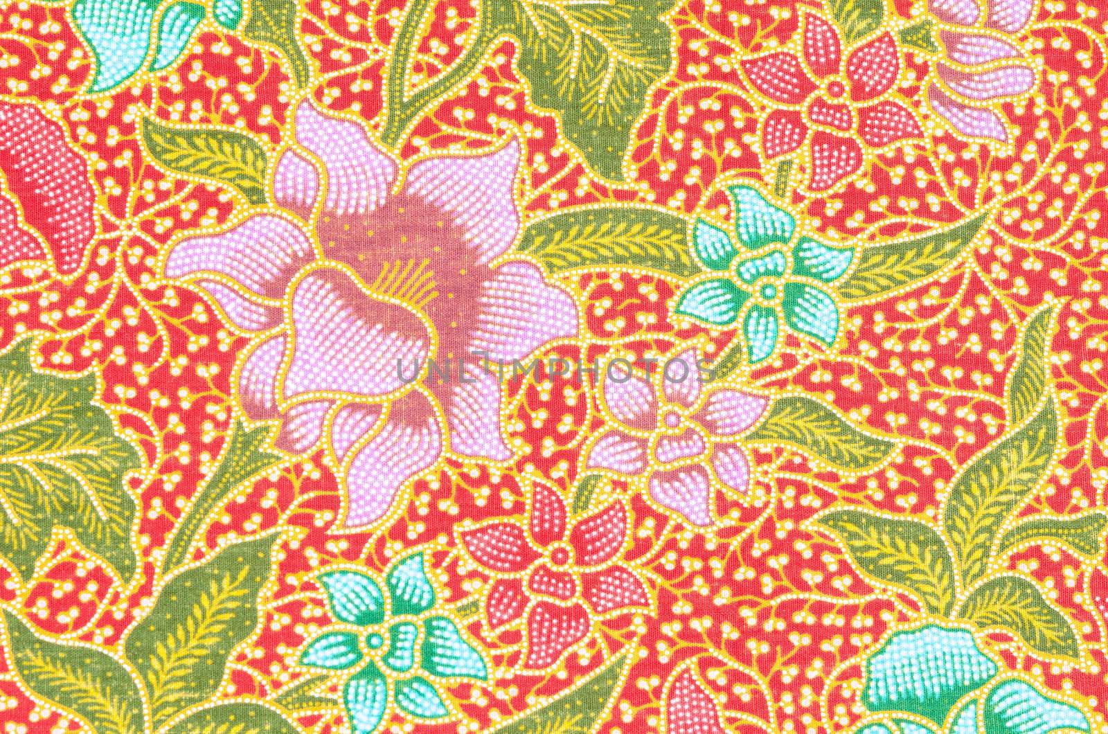 flower pattern background on batik fabric thai style.