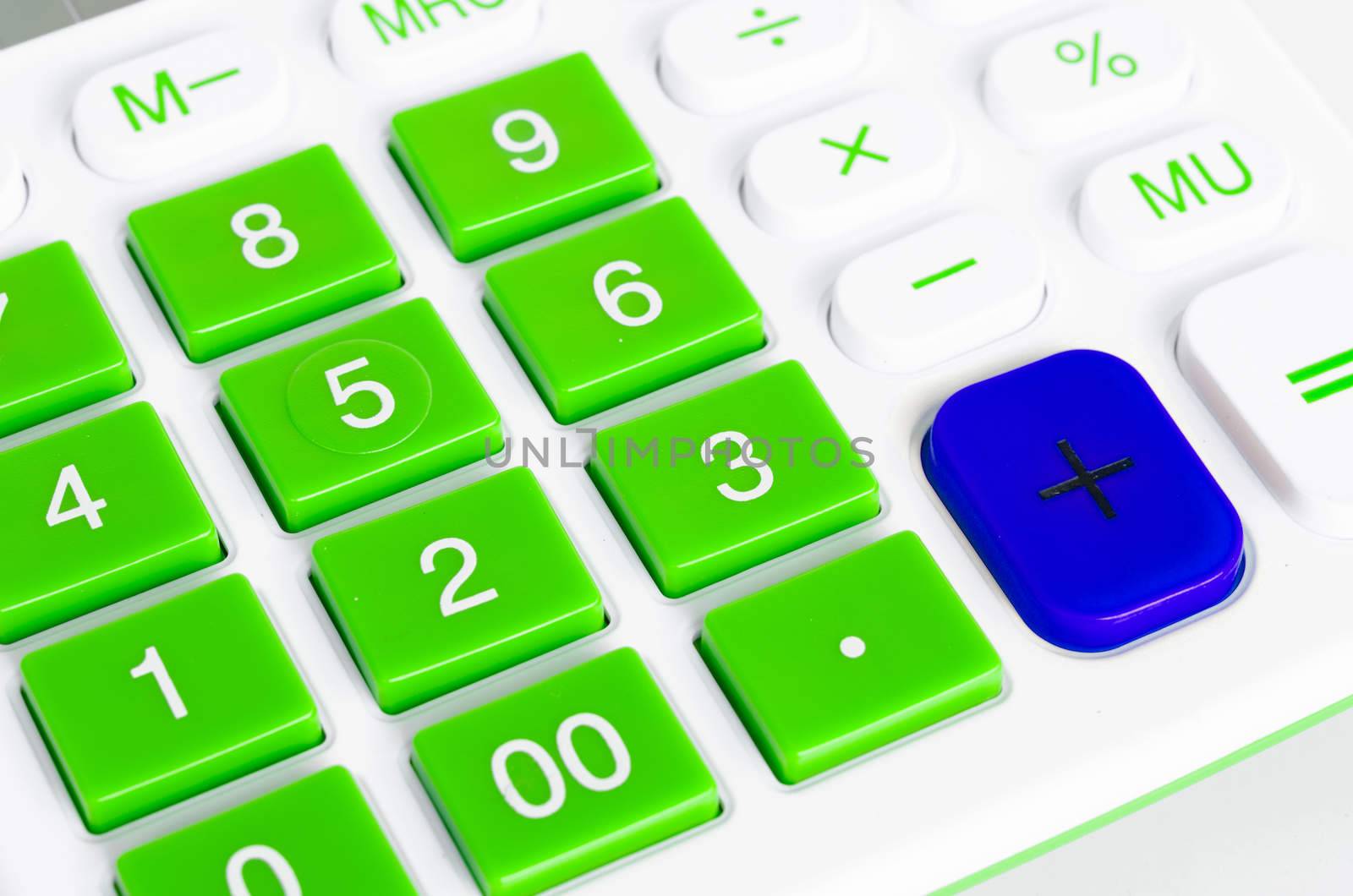 close up green number button calculator