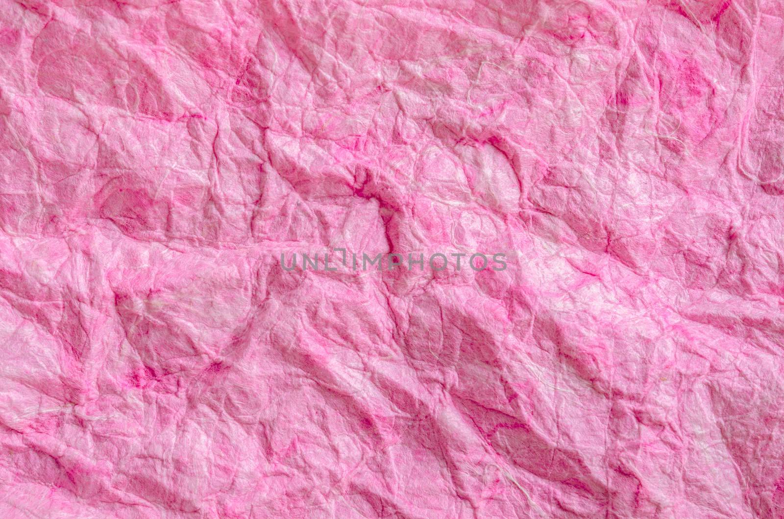 Pink paper background. by Gamjai