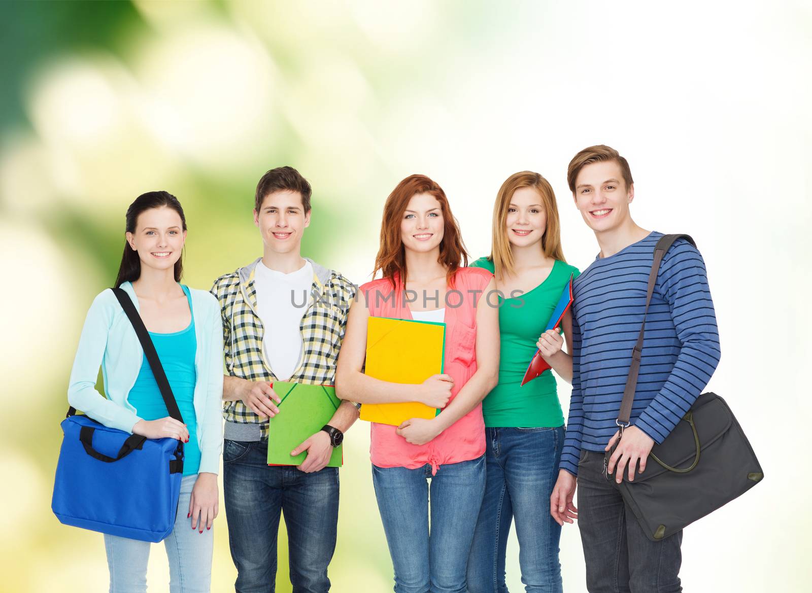 education and people concept - group of smiling students standing