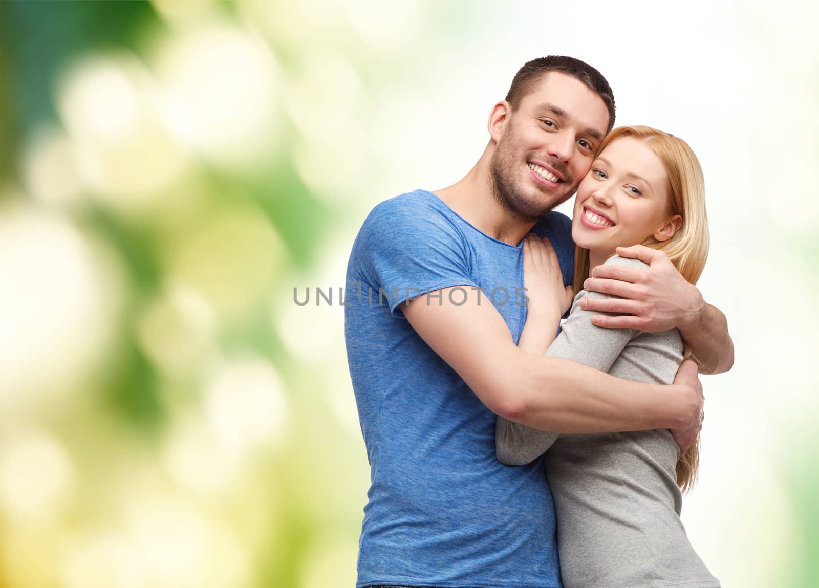 smiling couple hugging by dolgachov