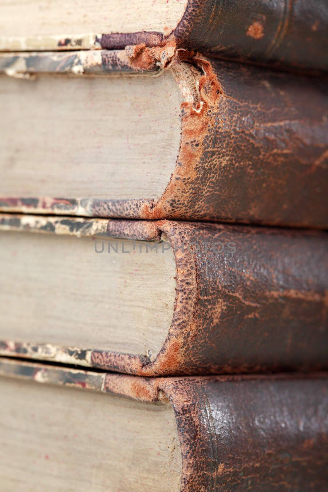 Library concept. Closeup of very old books stack