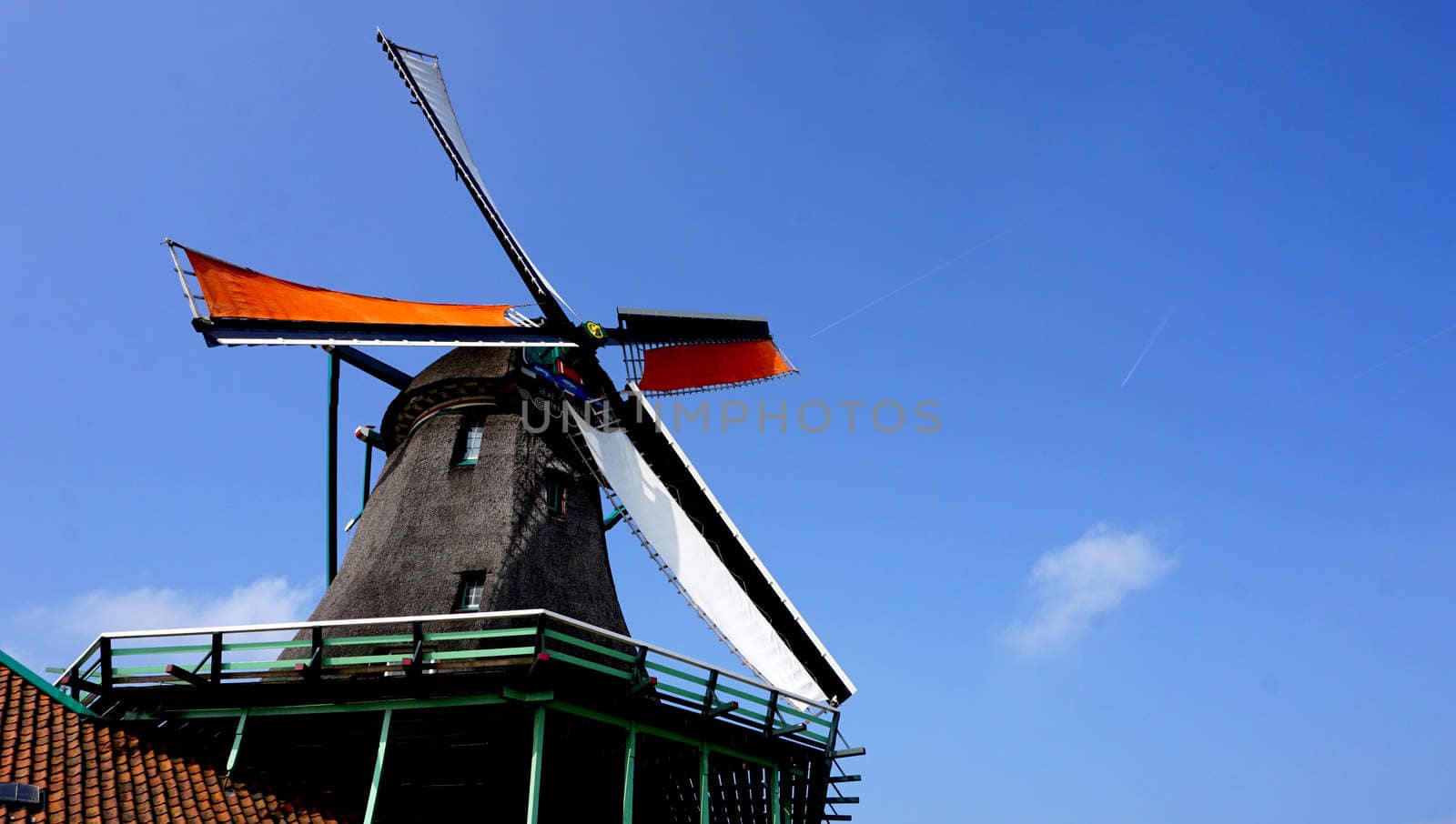 Windmills and blue sky background in holland