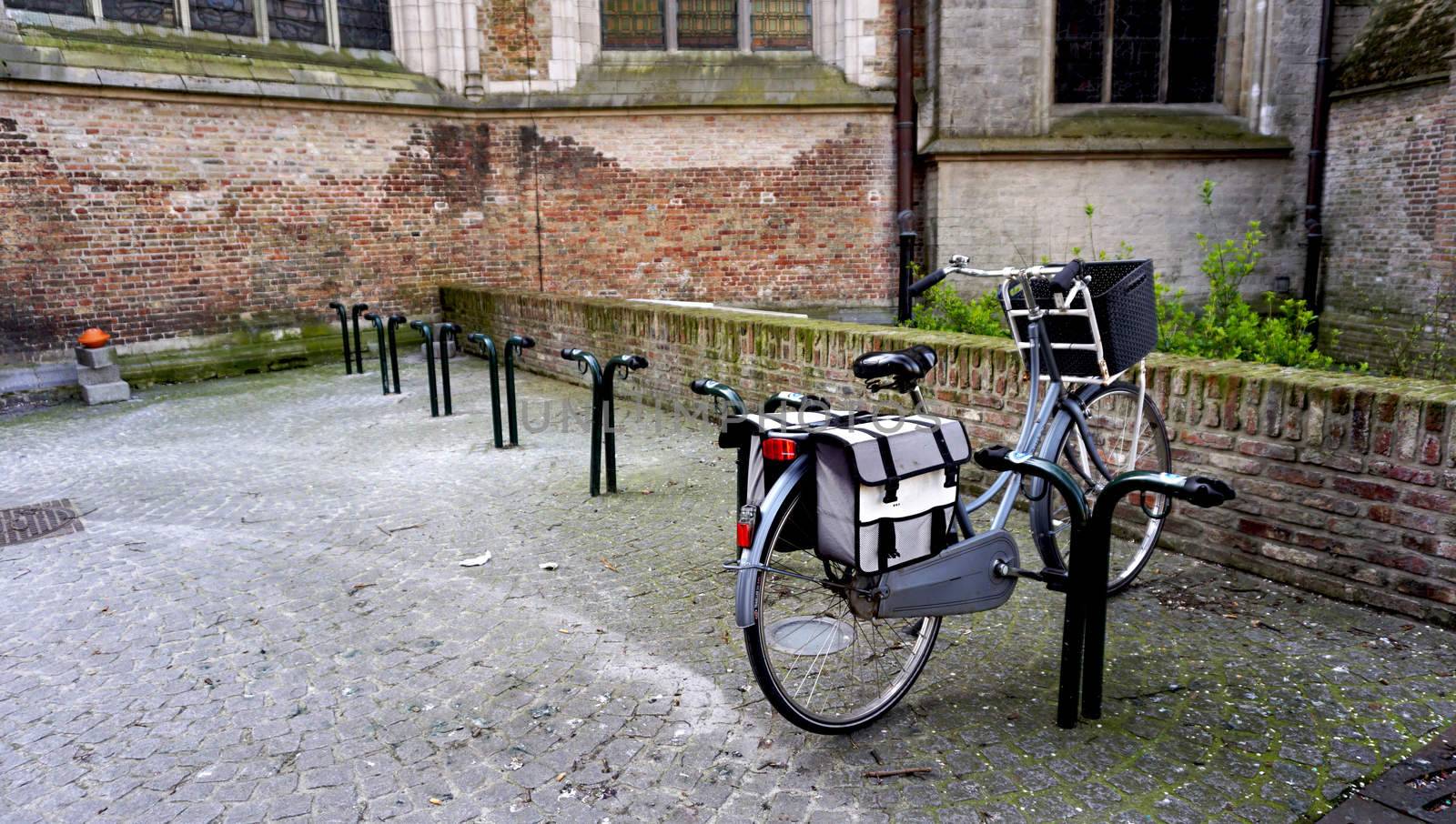 bicyble and lock in brugge Belgium by polarbearstudio