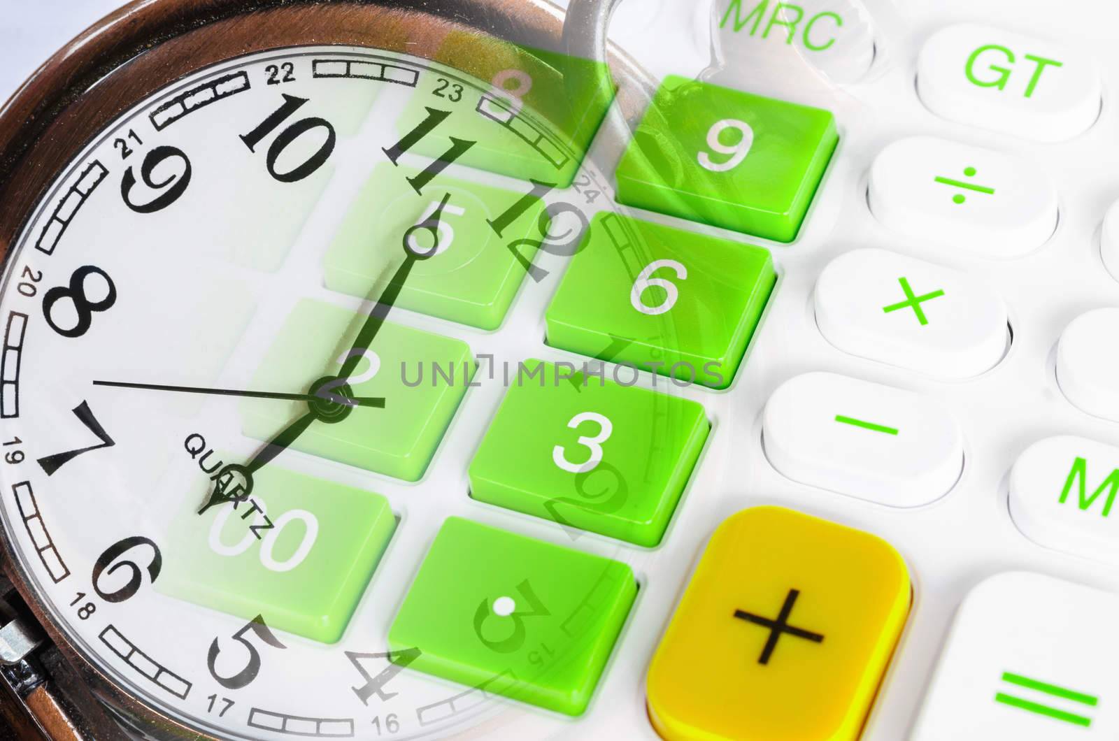 Business time concept. Pocket watch and green calculator.