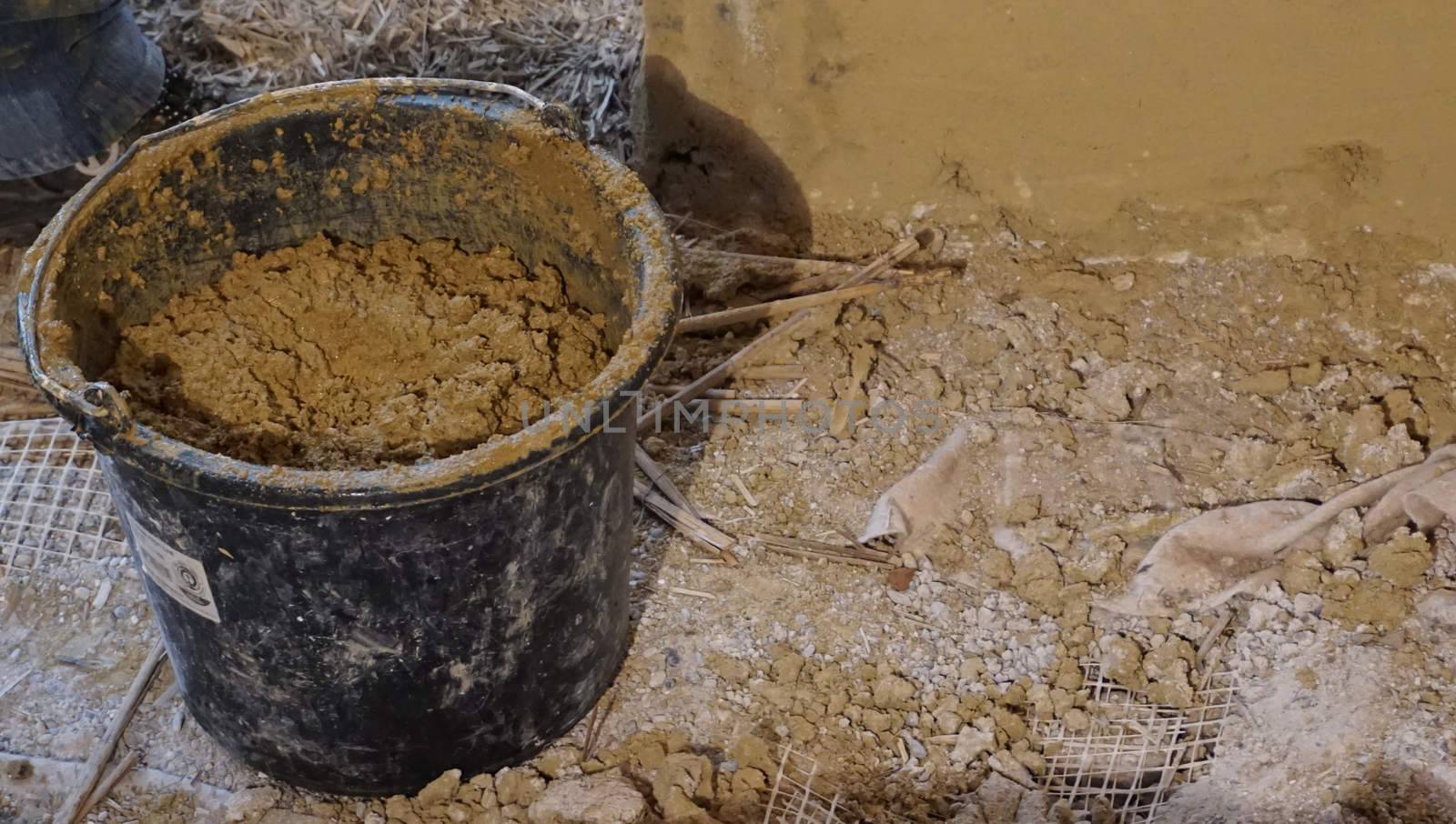 clay bucket on site for rending                               