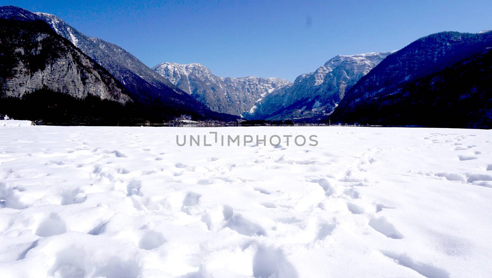 Snow winter landscape and mountain view of Hallstatt, Austria                  