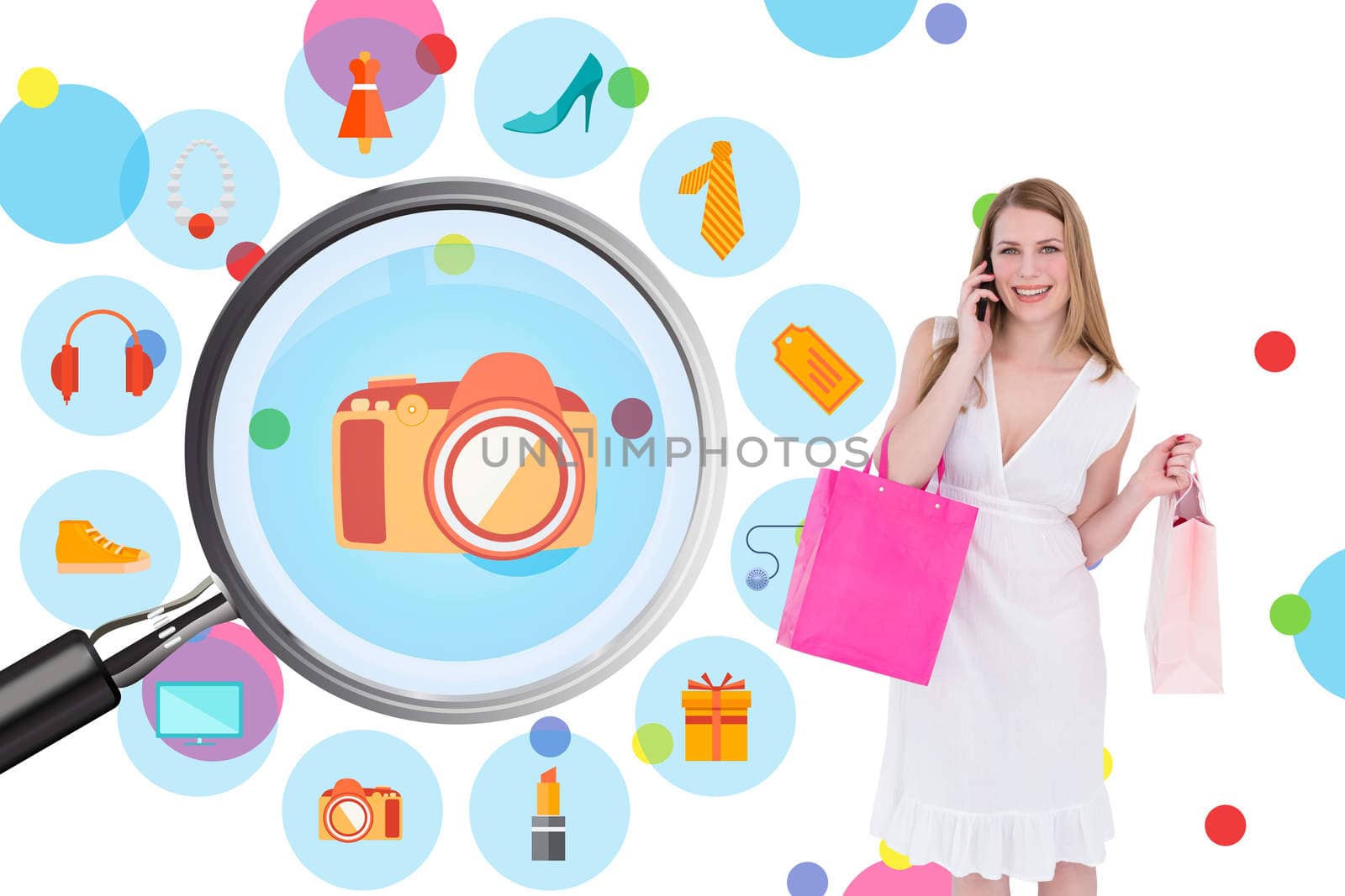 Happy blonde holding shopping bags and talking on phone against dot pattern