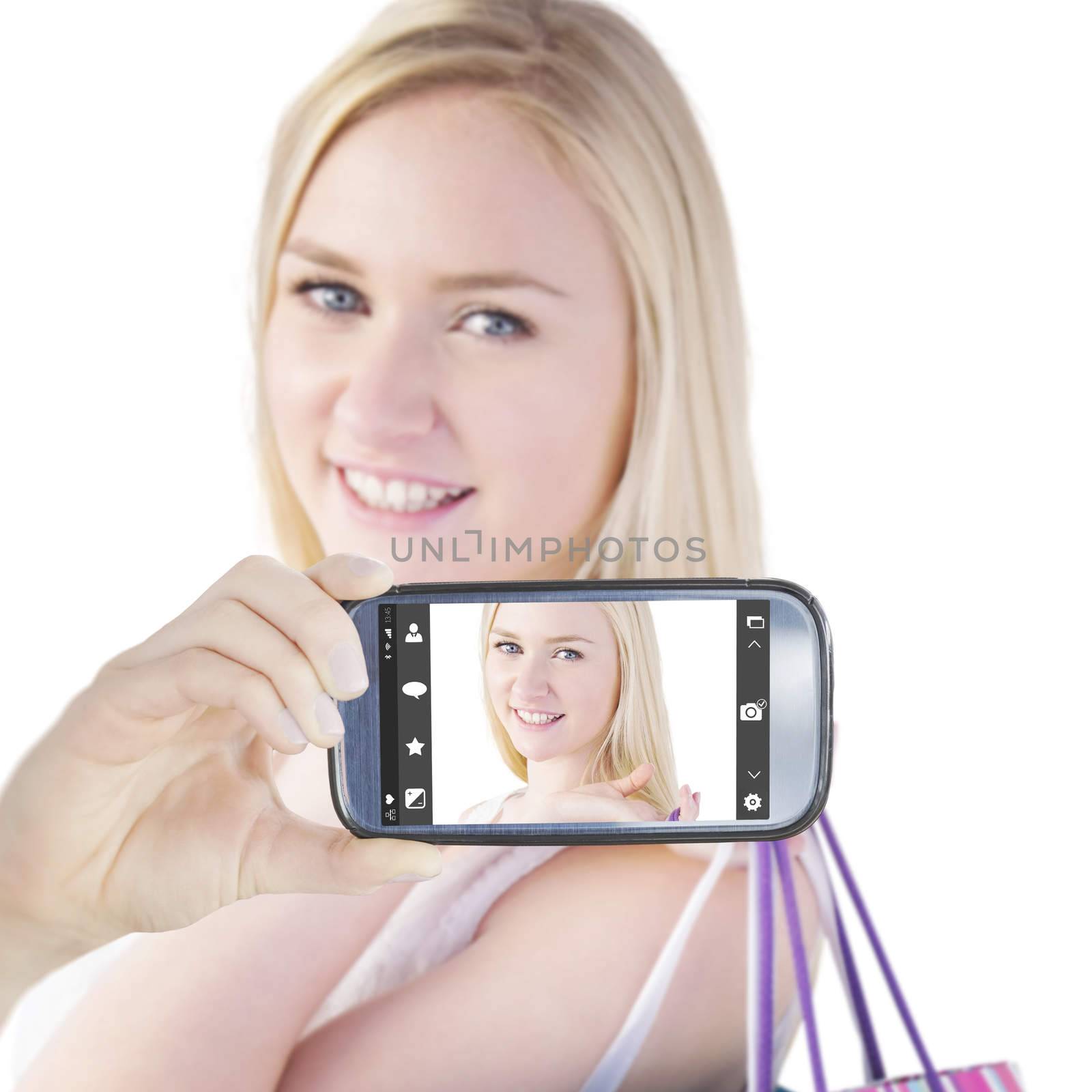 Composite image of hand holding smartphone showing by Wavebreakmedia