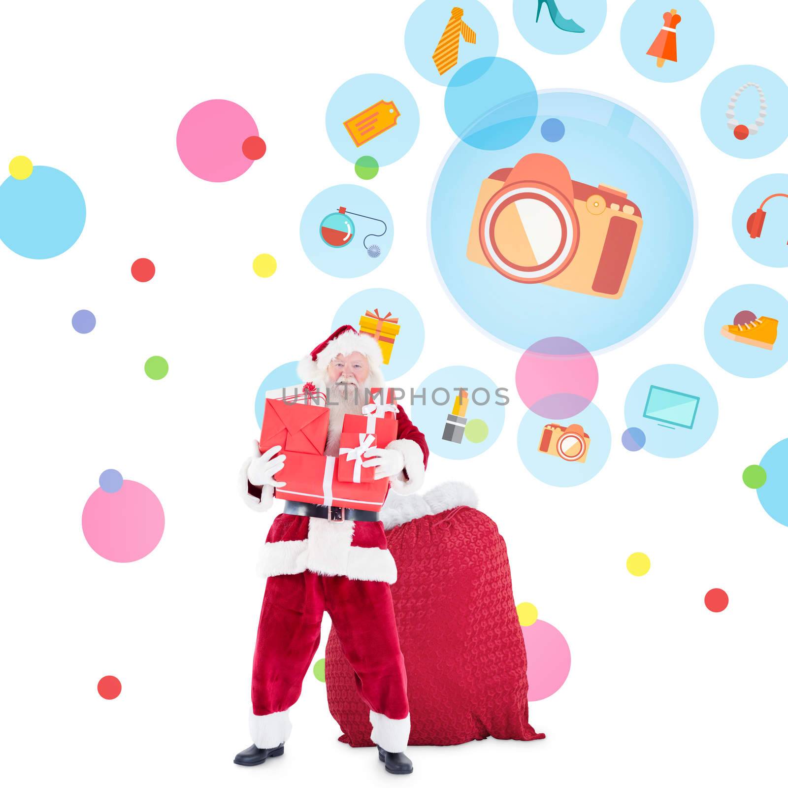 Santa holding pile of gifts against dot pattern