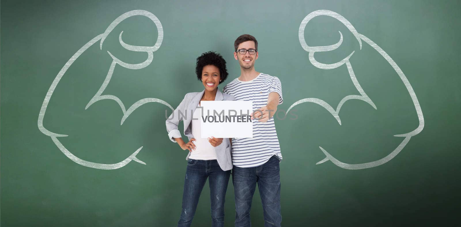 Portrait of a happy couple holding a volunteer note against green chalkboard