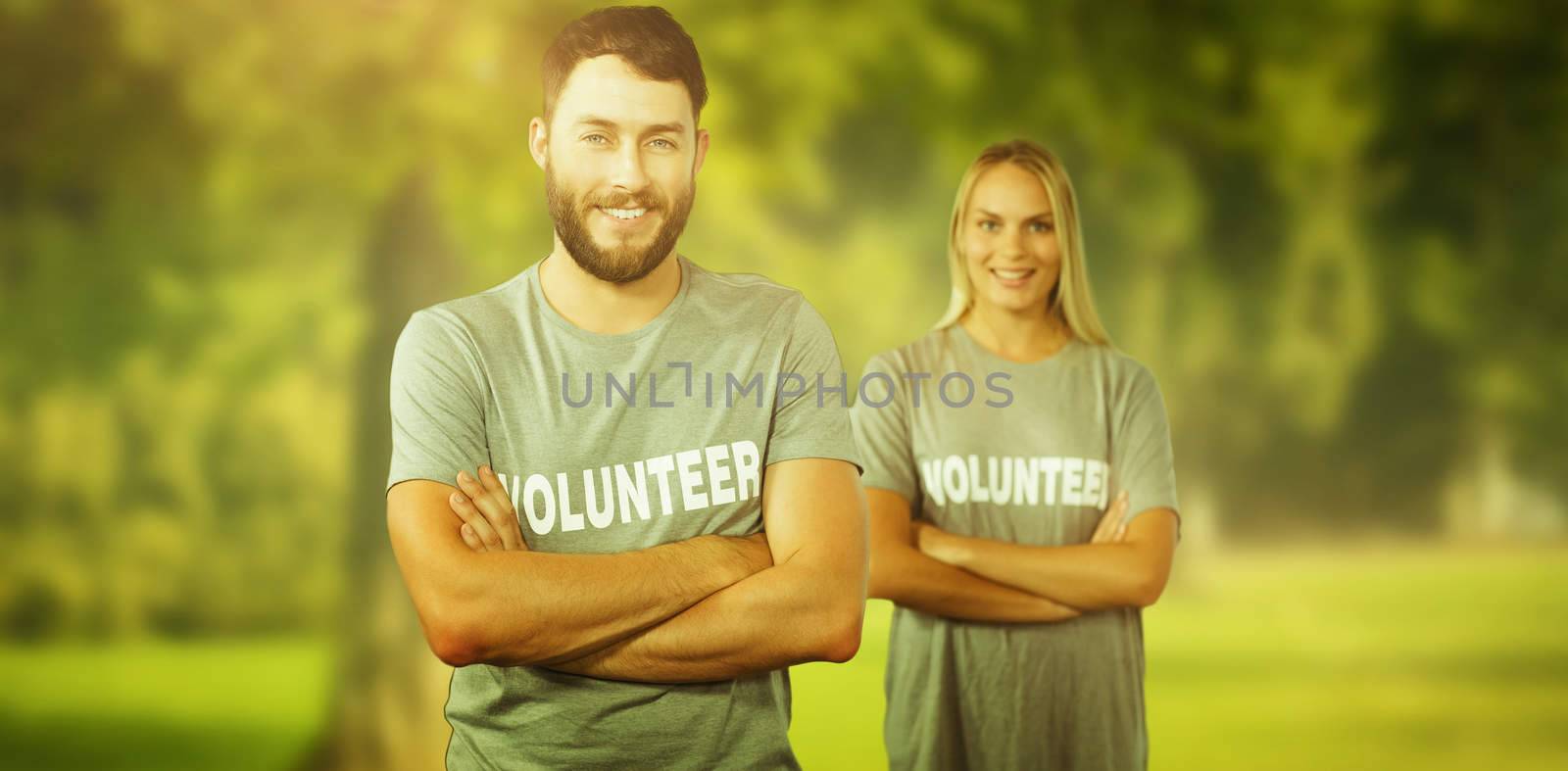 Composite image of portrait of cheerful volunteer in office  by Wavebreakmedia