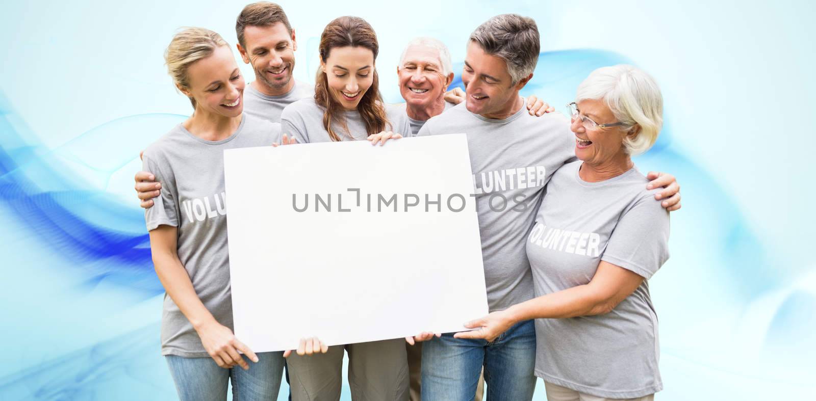 Happy volunteer family holding a blank  against blue abstract design