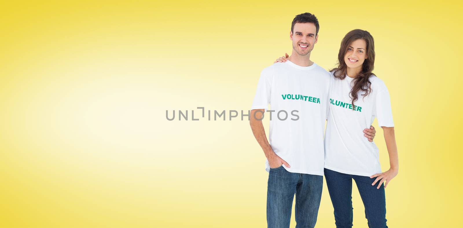 Two cheerful people wearing volunteer tshirt against yellow vignette
