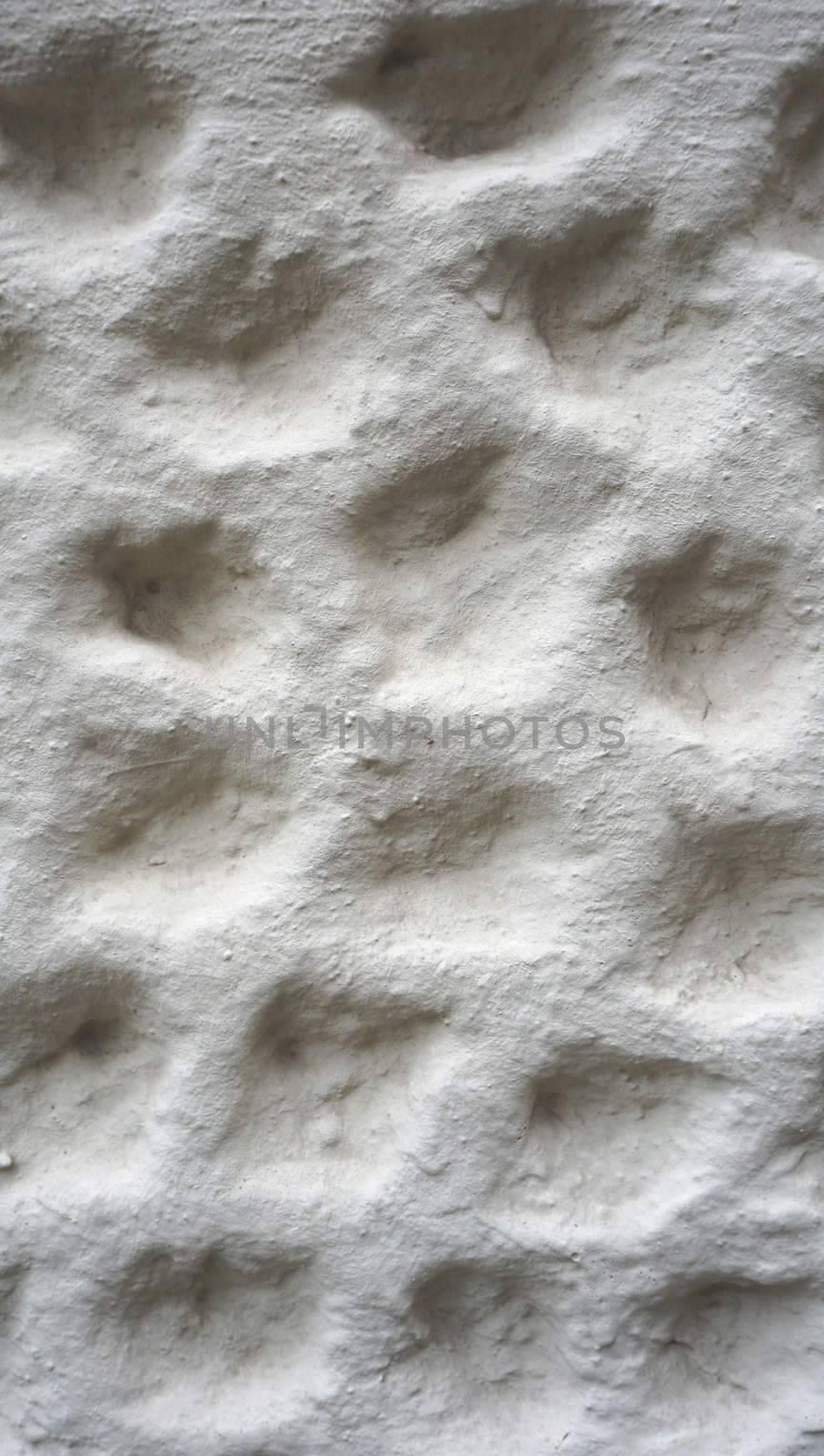 bubble texture on white cement wall finishing vertical