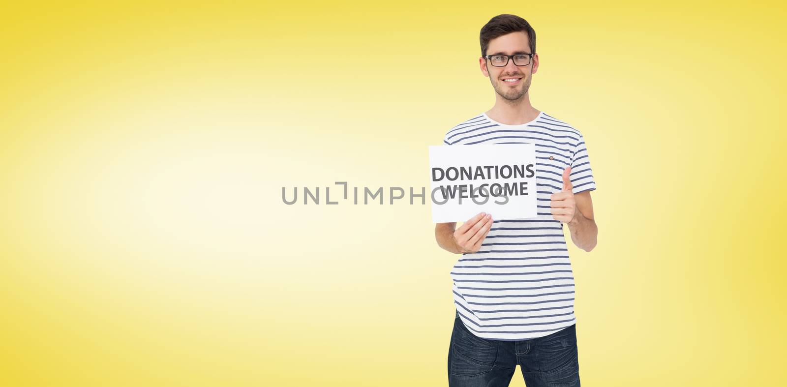 Man holding a donation welcome note while gesturing thumbs up against yellow vignette