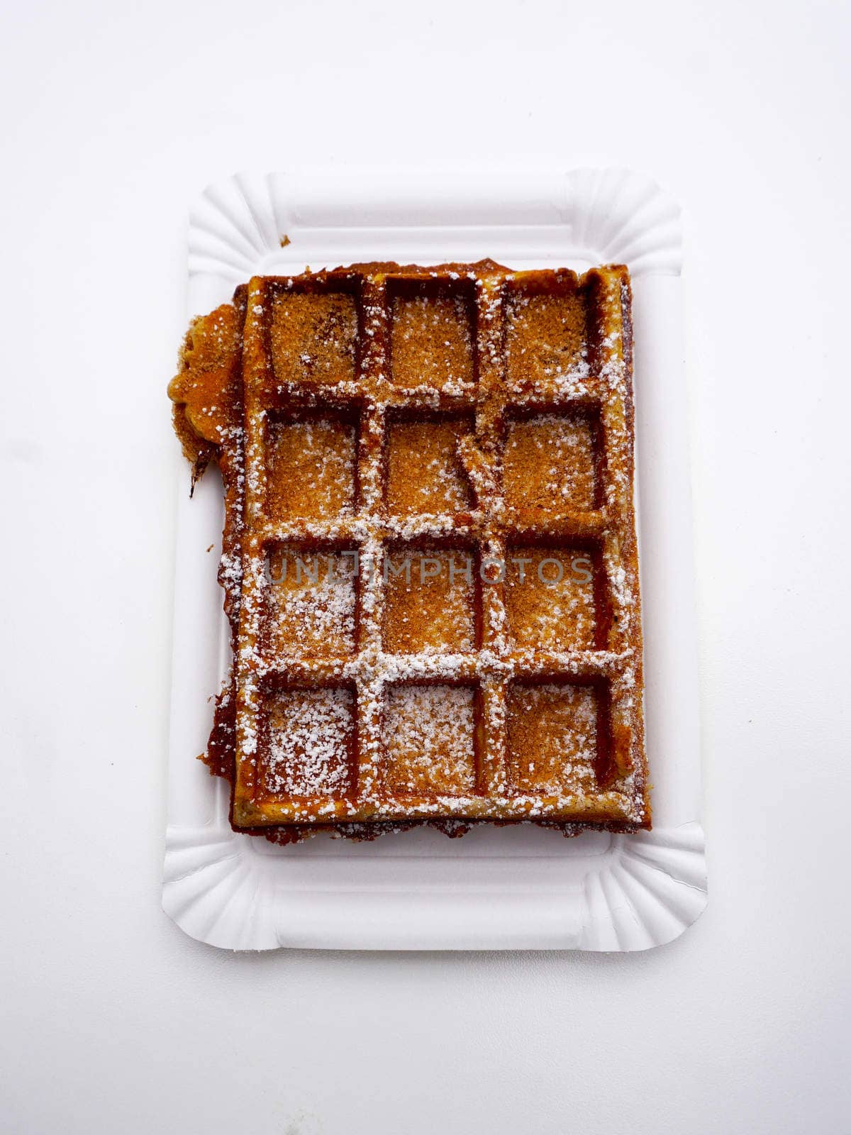 baked waffle with sugar top view by polarbearstudio