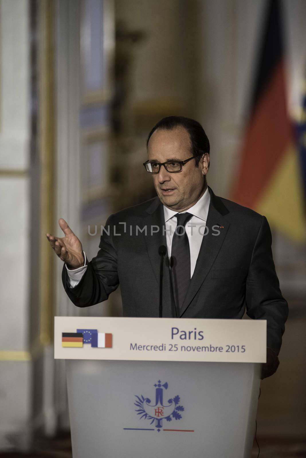 FRANCE, Paris: French President Francois Hollande talks during a joint press conference with German Chancellor Angela Merkel at the Elysee Presidential Palace, in Paris, on November 25, 2015. Mr Hollande is seeking to establish a 'grand and single coalition' to fight the Islamic State group, also known as Daesh or ISIS, in the aftermaths of the November-13 Paris terror attacks.