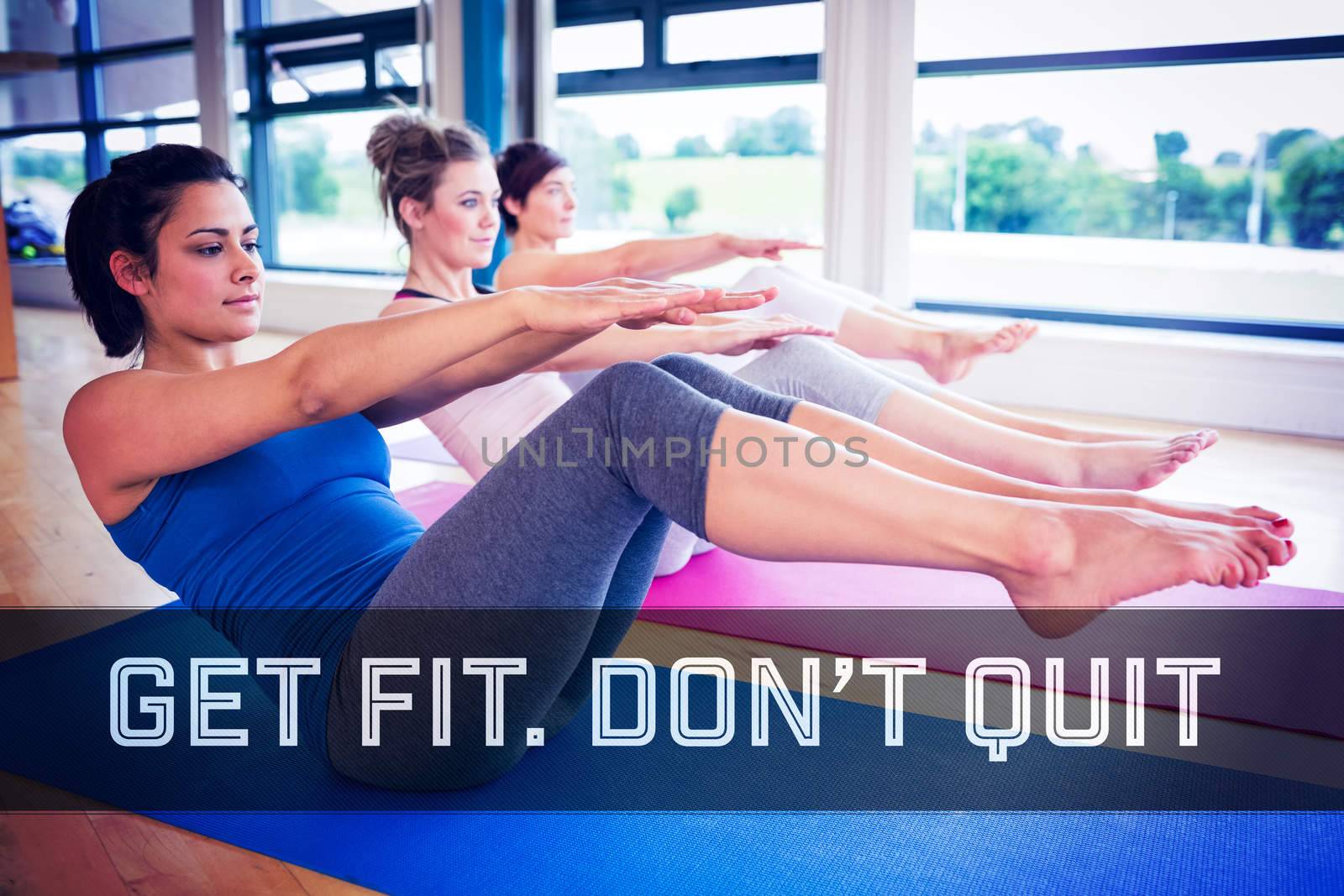 Women doing boat pose in yoga class against motivational new years message