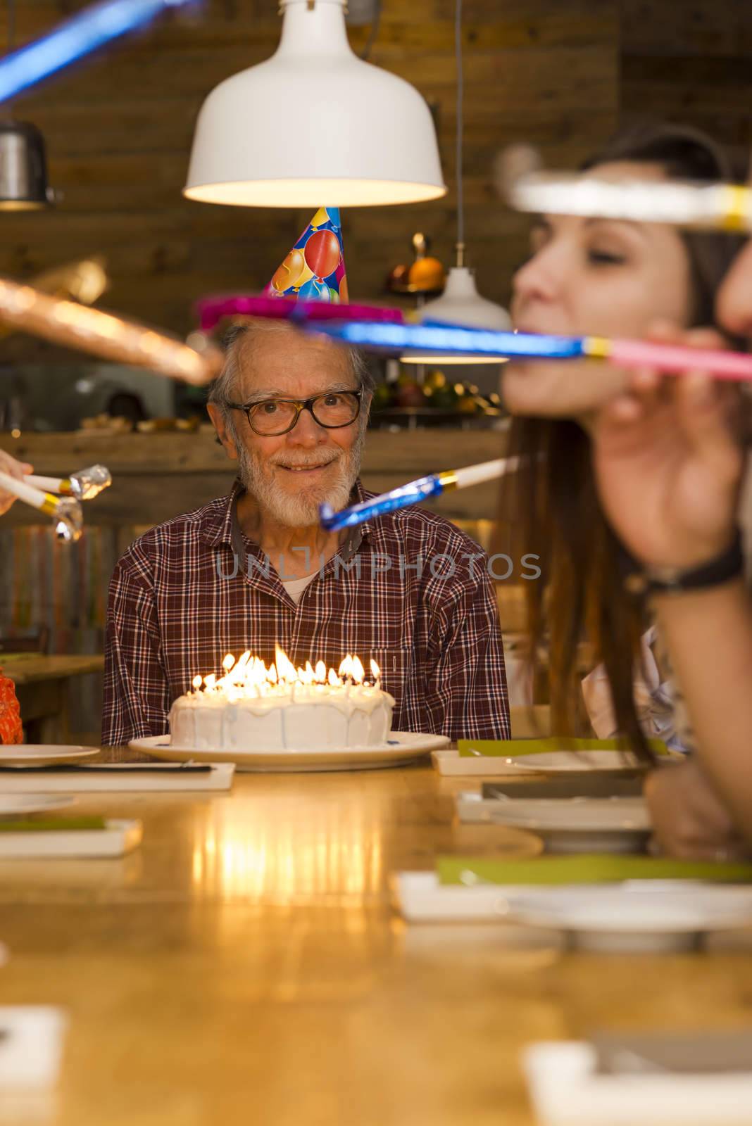 Big family celebrate the birthday of the grandfather