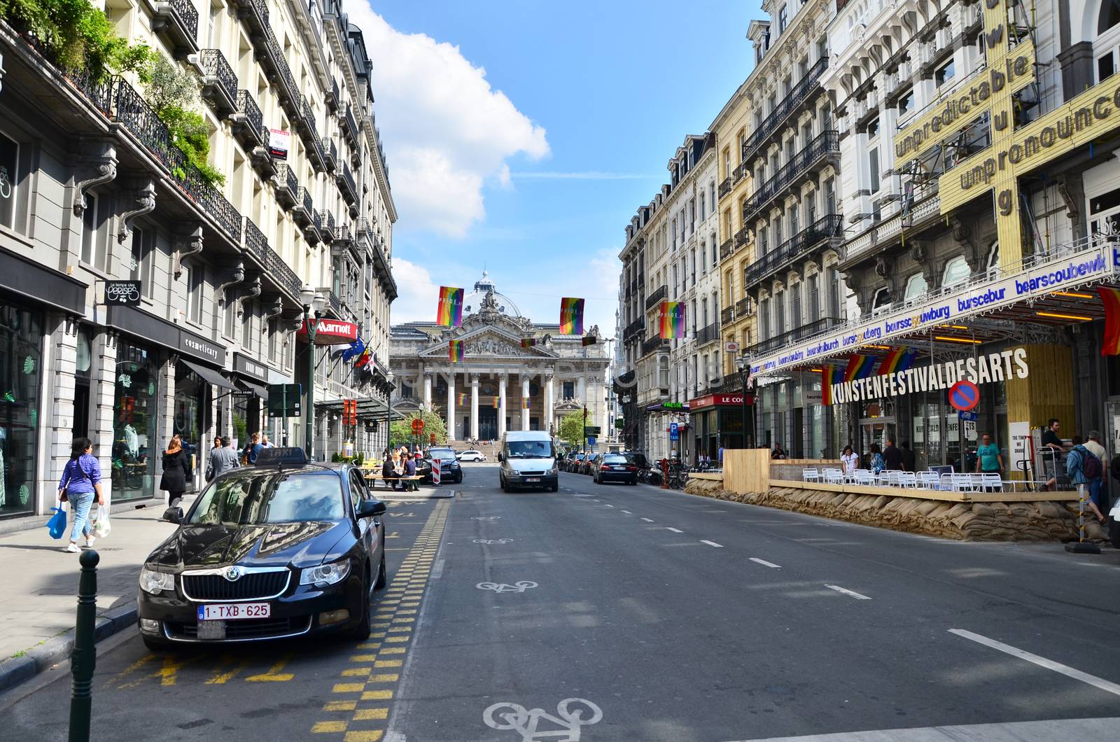 Brussels, Belgium - May 12, 2015: Peoples at Street approach to Brussels Stock Exchange by siraanamwong