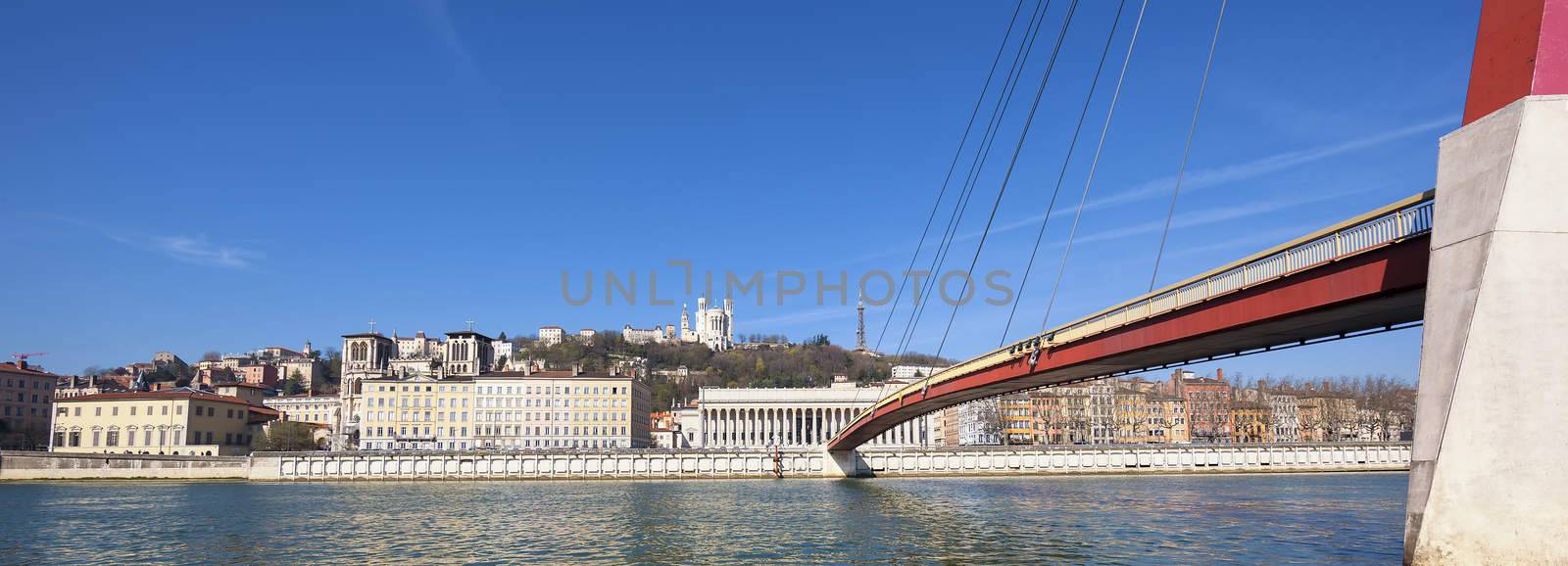 Saone river at Lyon with red footbridge by vwalakte