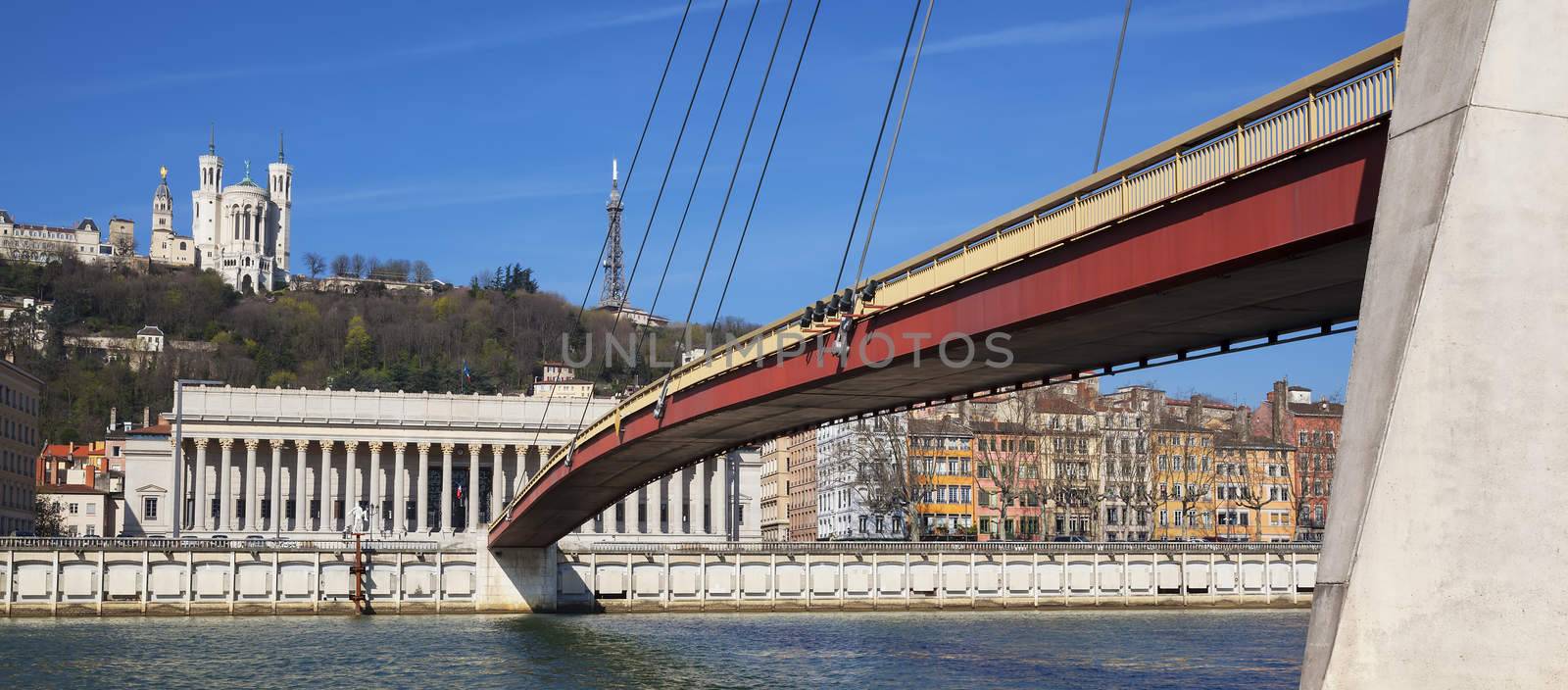 view of Saone river at Lyon with red footbridge by vwalakte