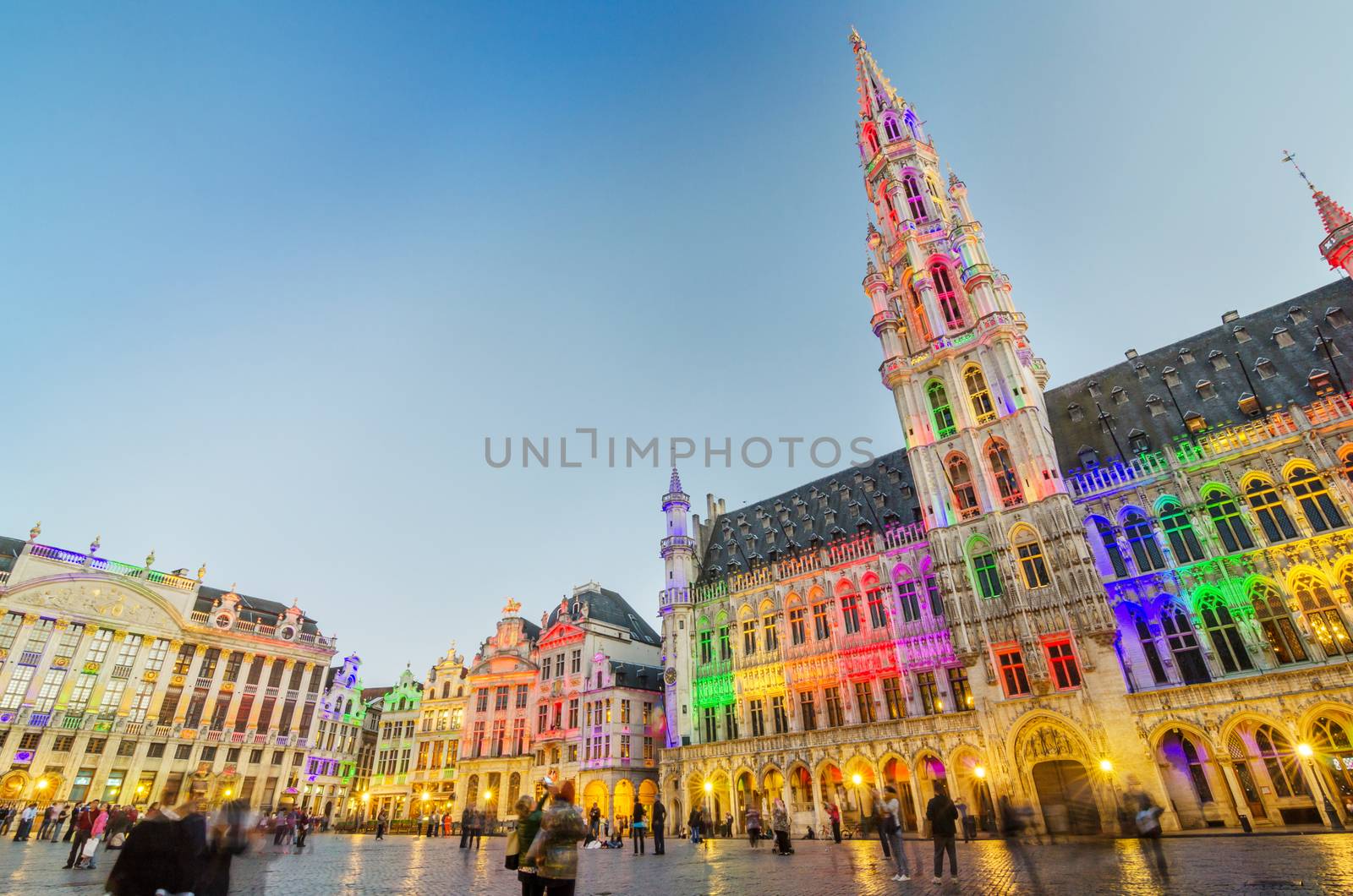 Brussels, Belgium - May 13, 2015: Tourists visiting famous Grand Place the central square of Brussels by siraanamwong
