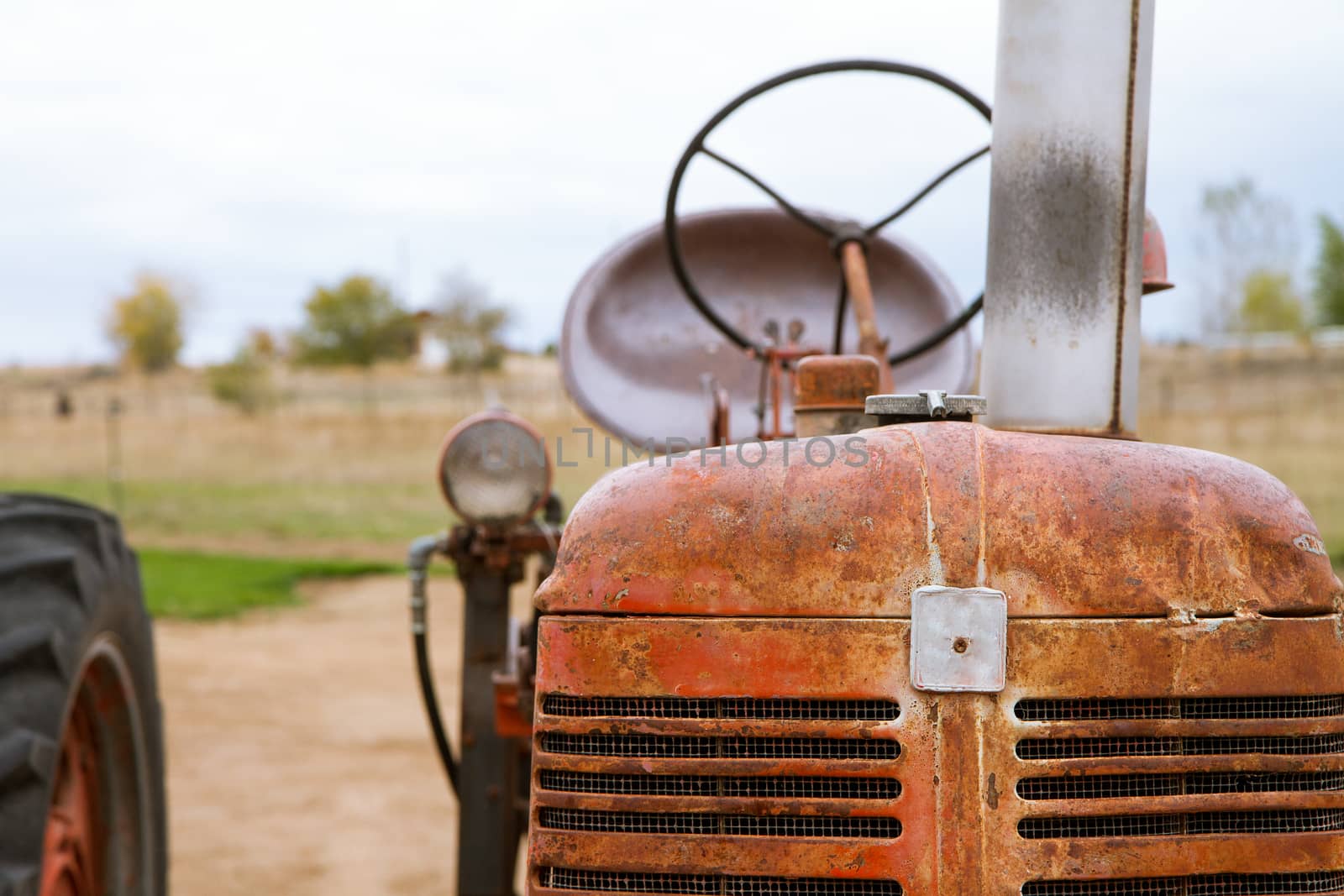 Old worn out tractor just waitintg to be used again
