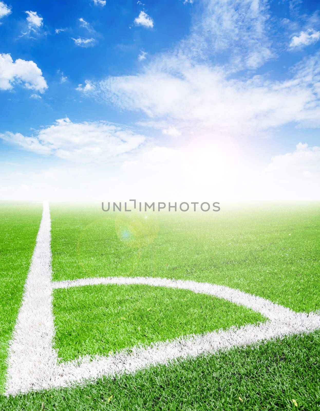 Corner kick of field soccer and blue sky. by Gamjai