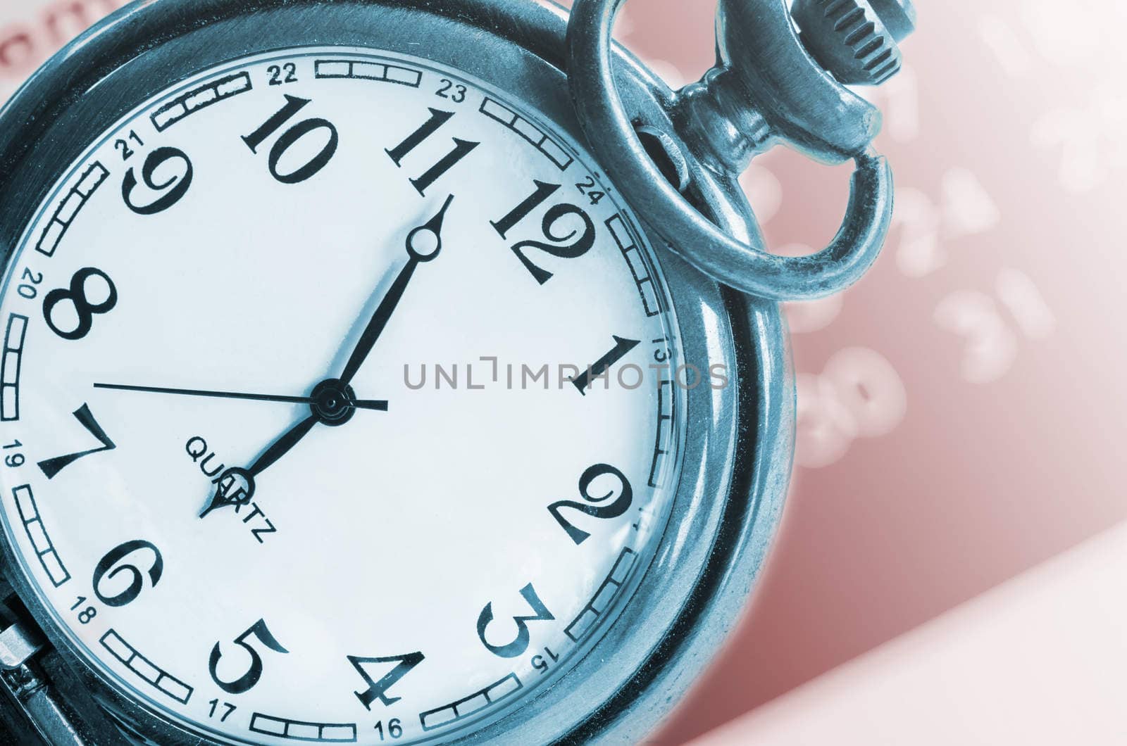 Vintage clock on beautiful pink background