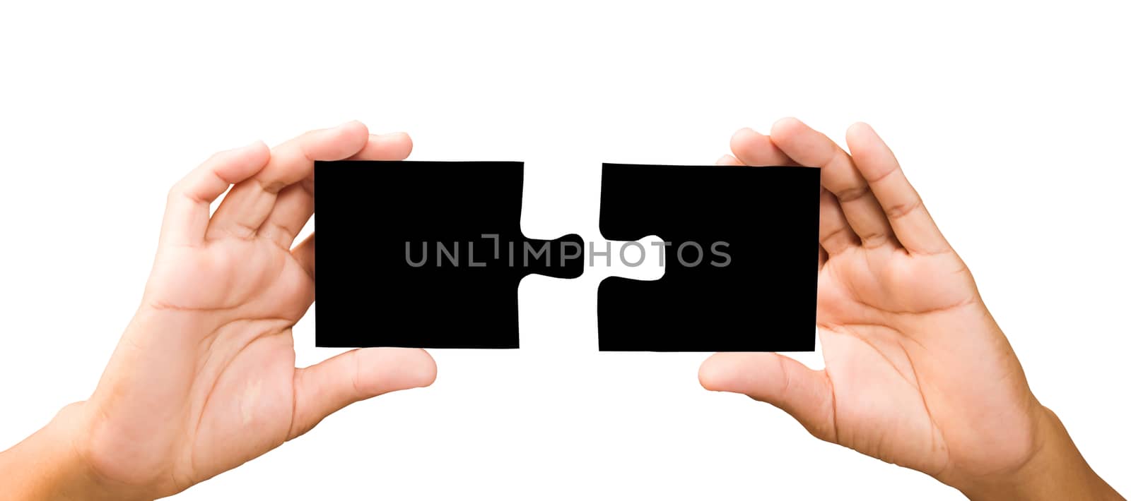 connection concept. hands with pieces of black puzzle on white background, clipping path