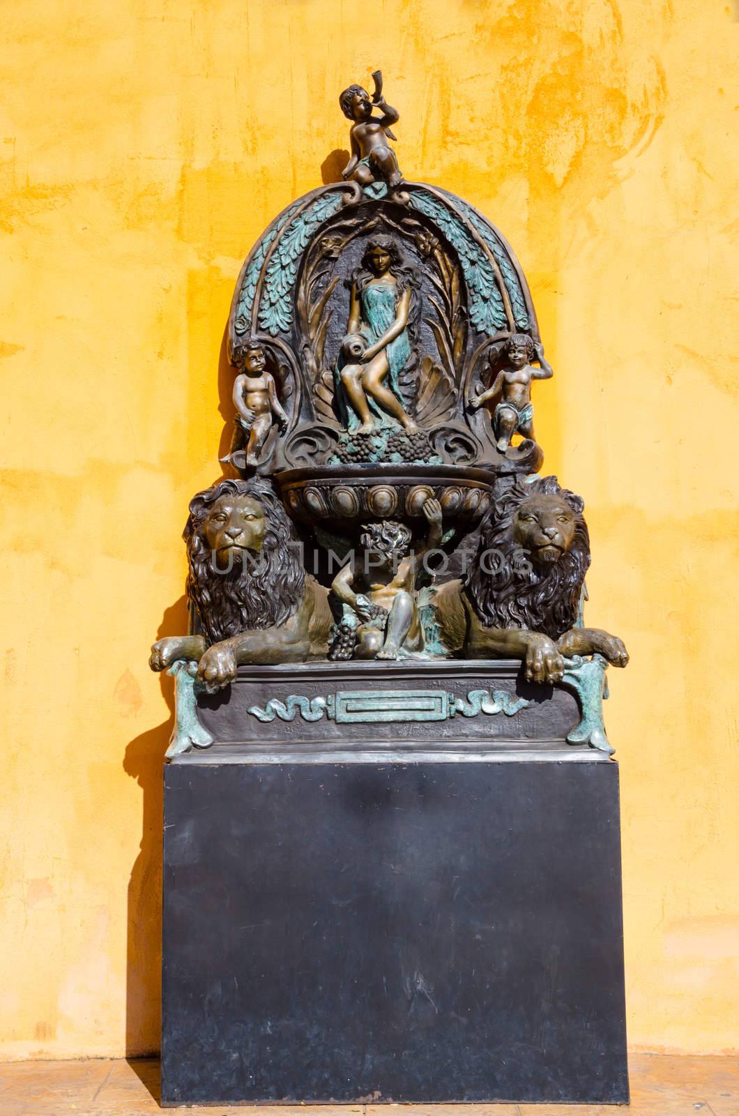 Lion and woman Statue on orange backgrounds,Thailand