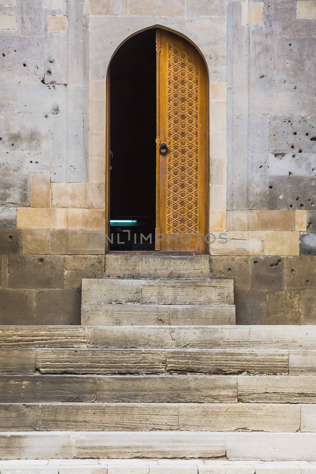 Simple Islamic style half open doorway in Shirvanshah's Palace, famous historical landmark of Baku, Azerbaijan