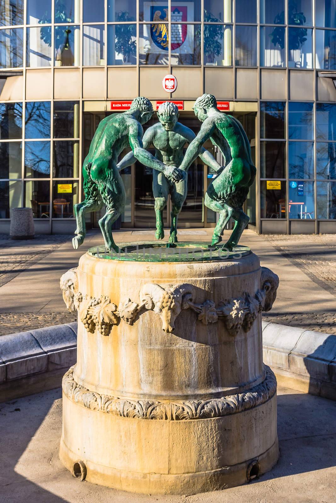 Sculpture in front of the city hall in Gliwice. Locals say fauns symbolize mayors of Bytom, Gliwice and Zabrze who could not reach an agreement on planned merger before WWII.