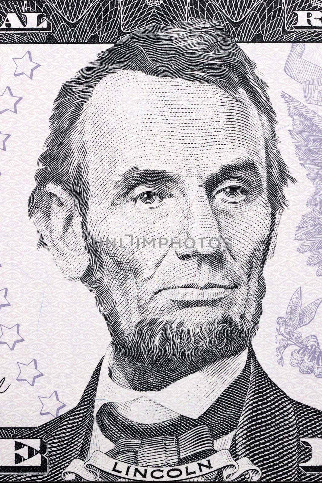 Portrait of Abraham Lincoln on five American dollars