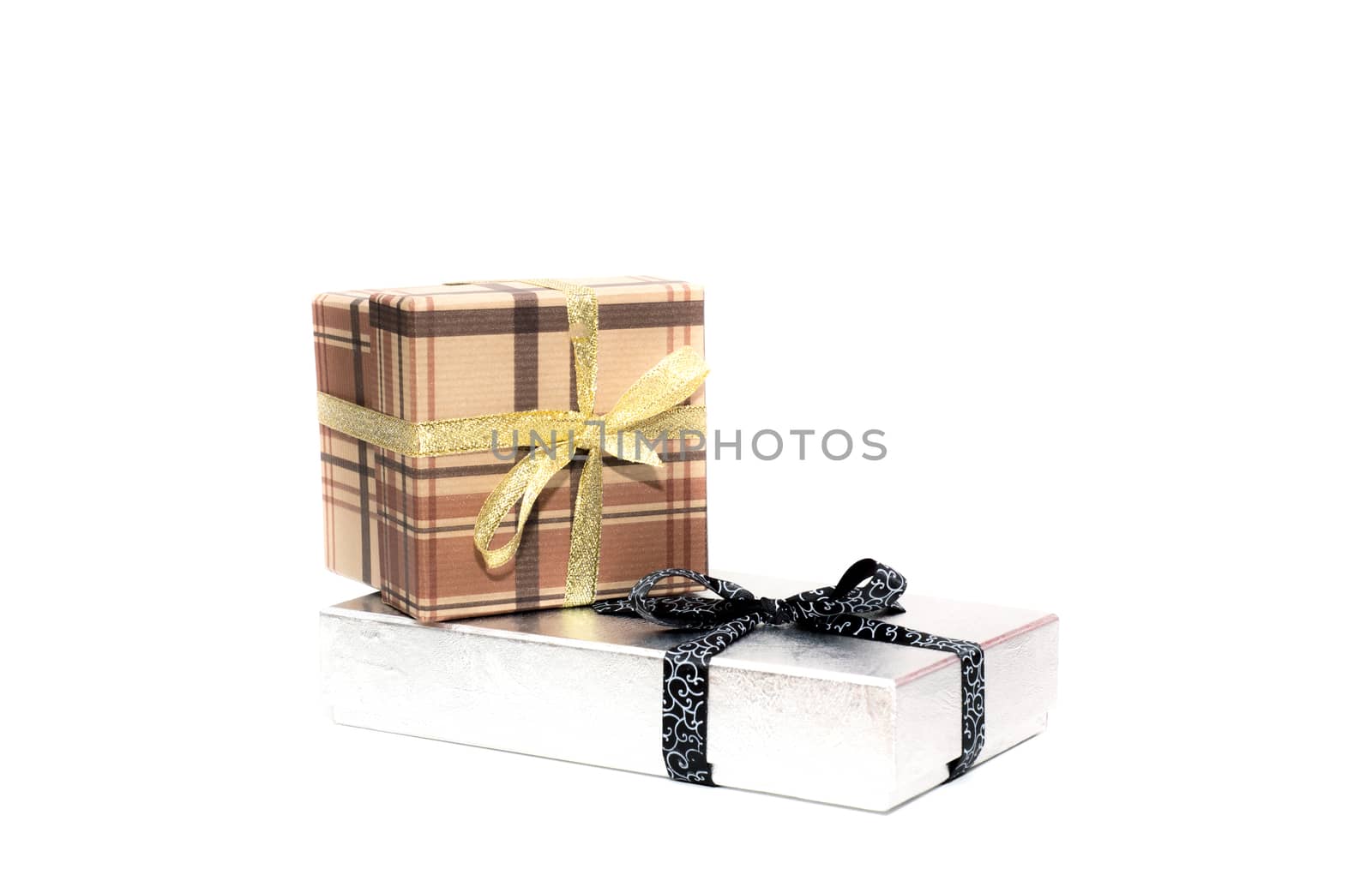 brown and silver gift box with bow on white background