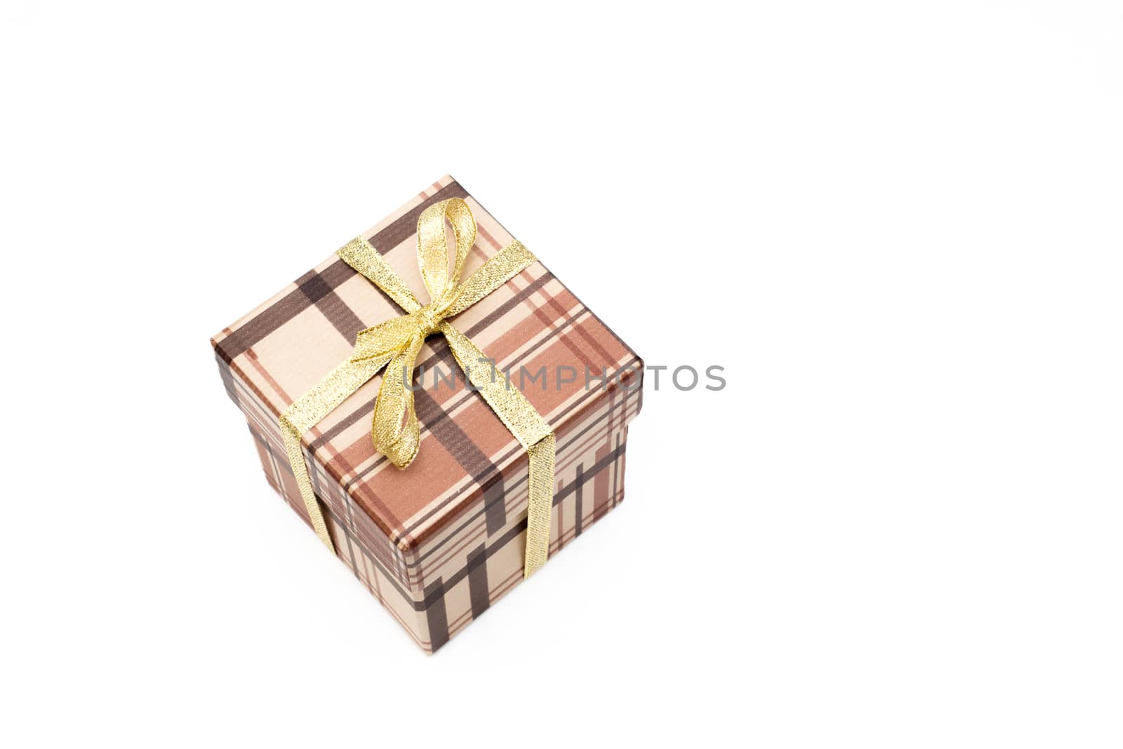 brown gift box with bow on white background by vlaru