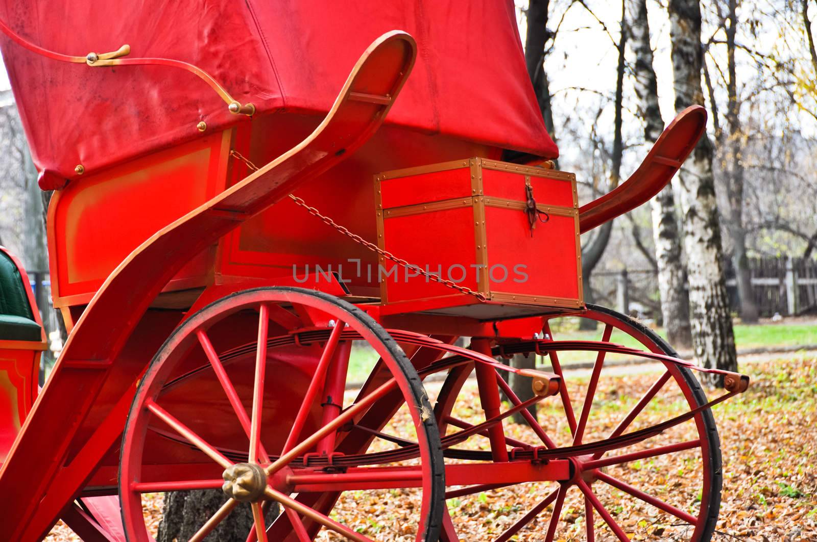 details of the red horse carriages