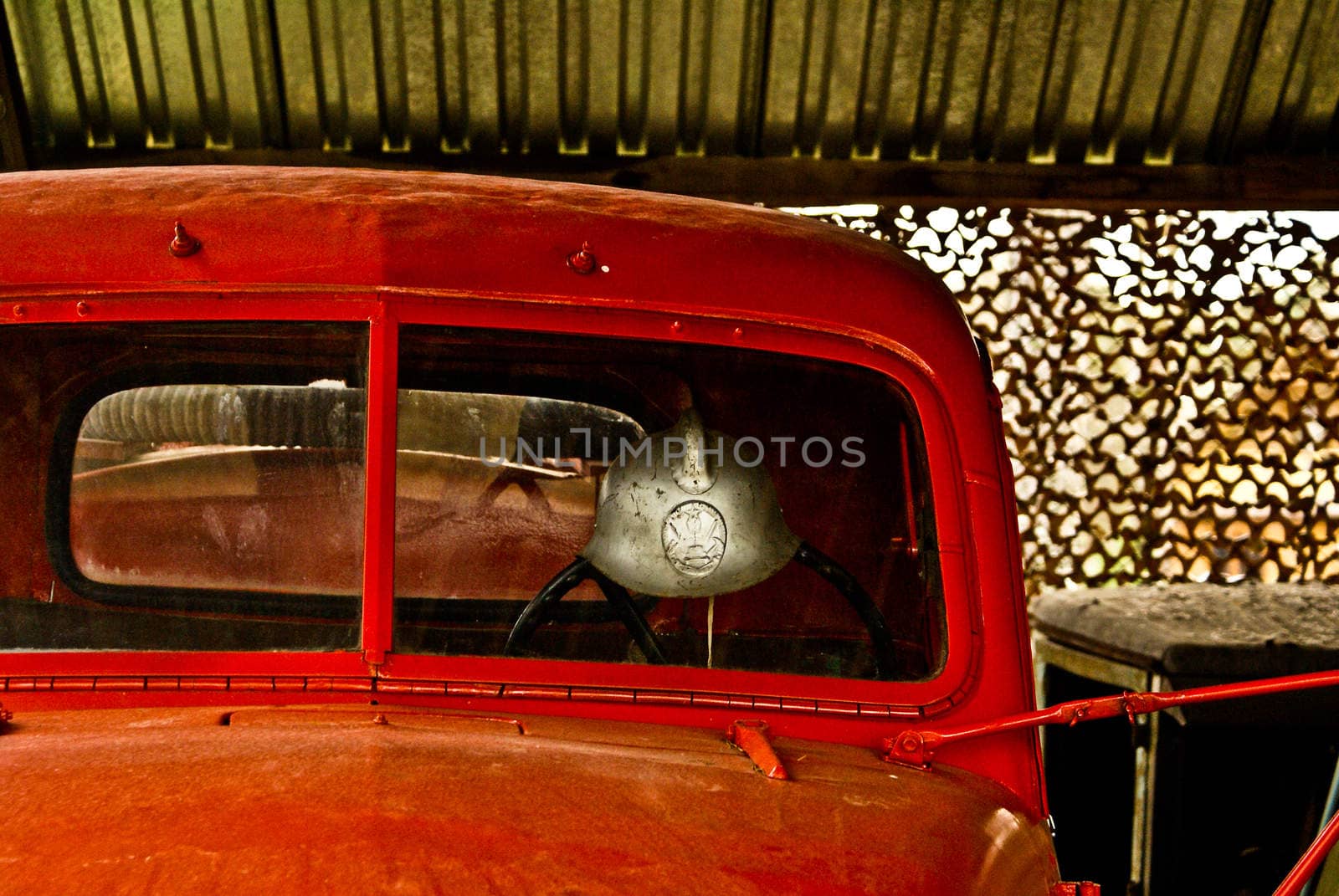 front of red oldtimer truck cabin by vlaru