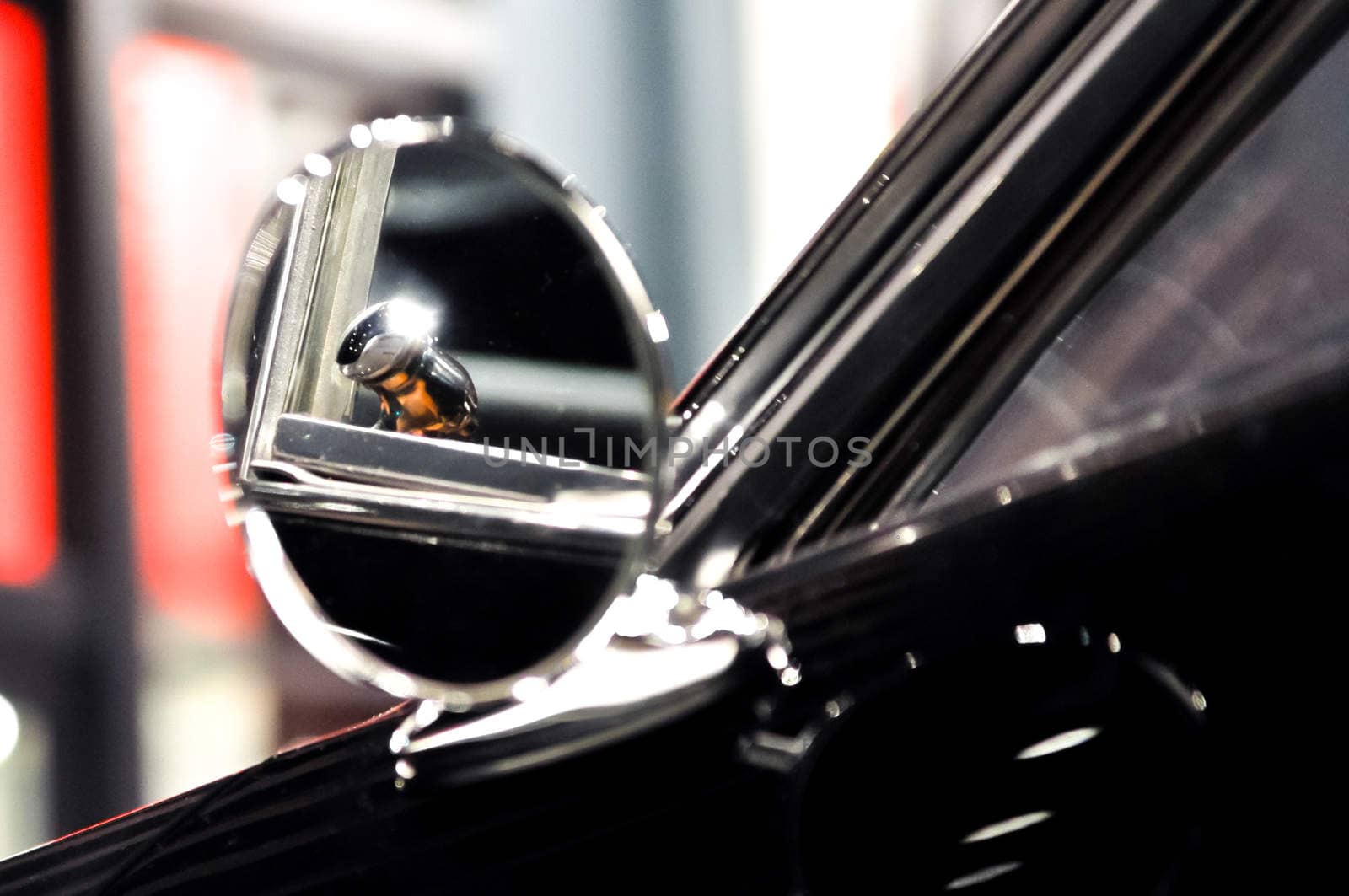 the oldtimer rear view round mirror closeup