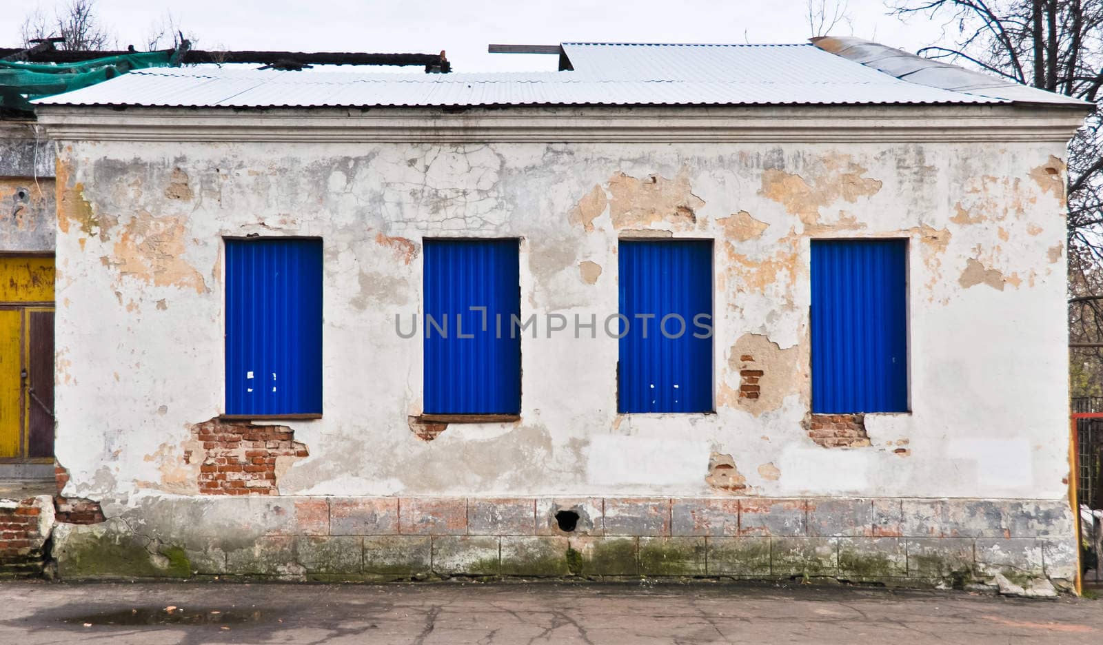 old abandoned wooden white  building