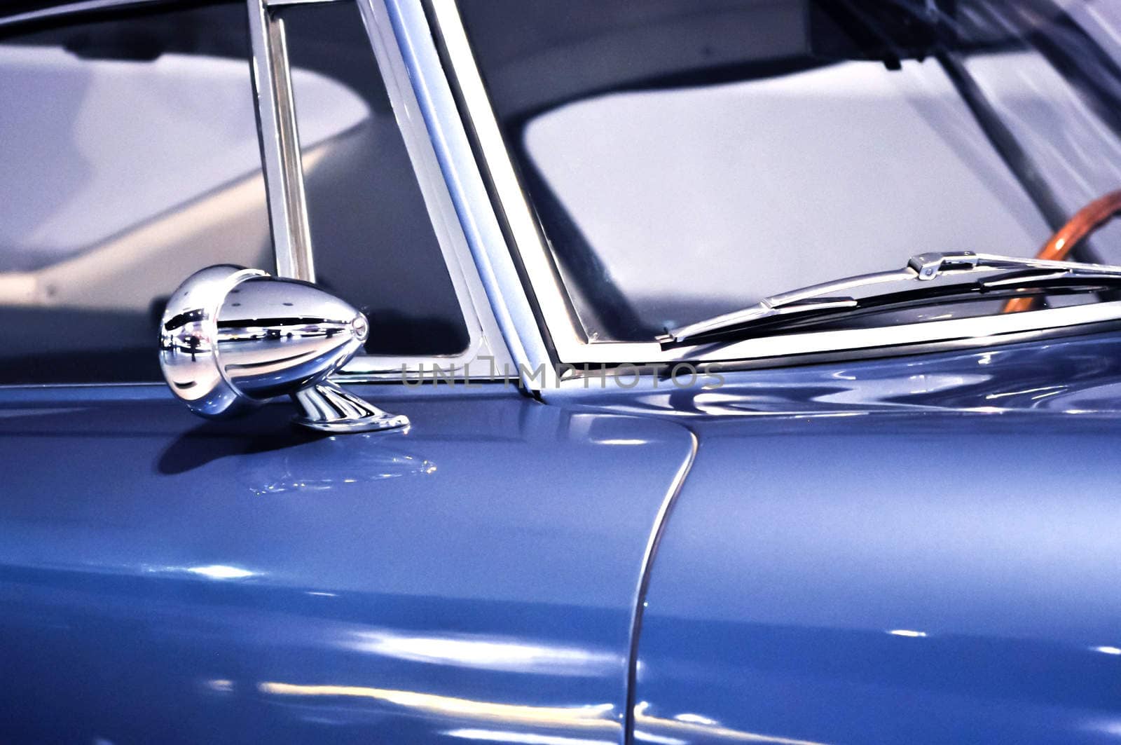 rear view mirror and car wipers on blue oldtimer