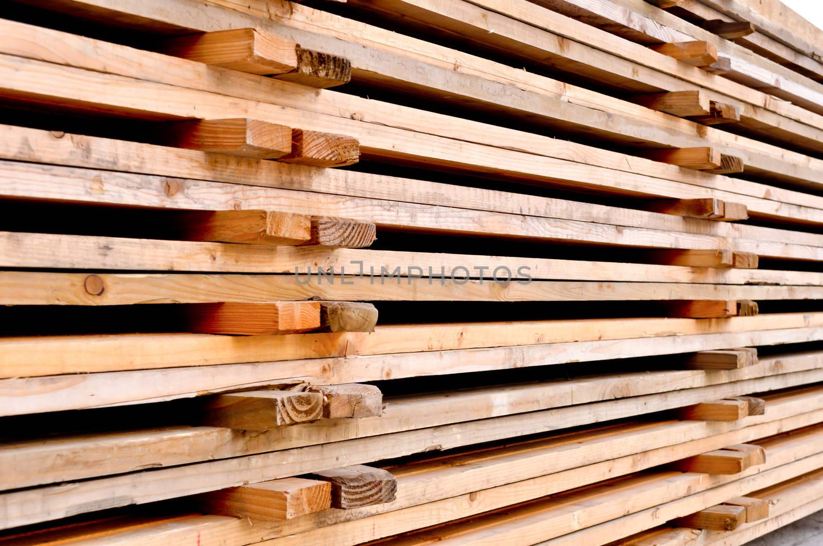 a stack of the wooden pallets by vlaru