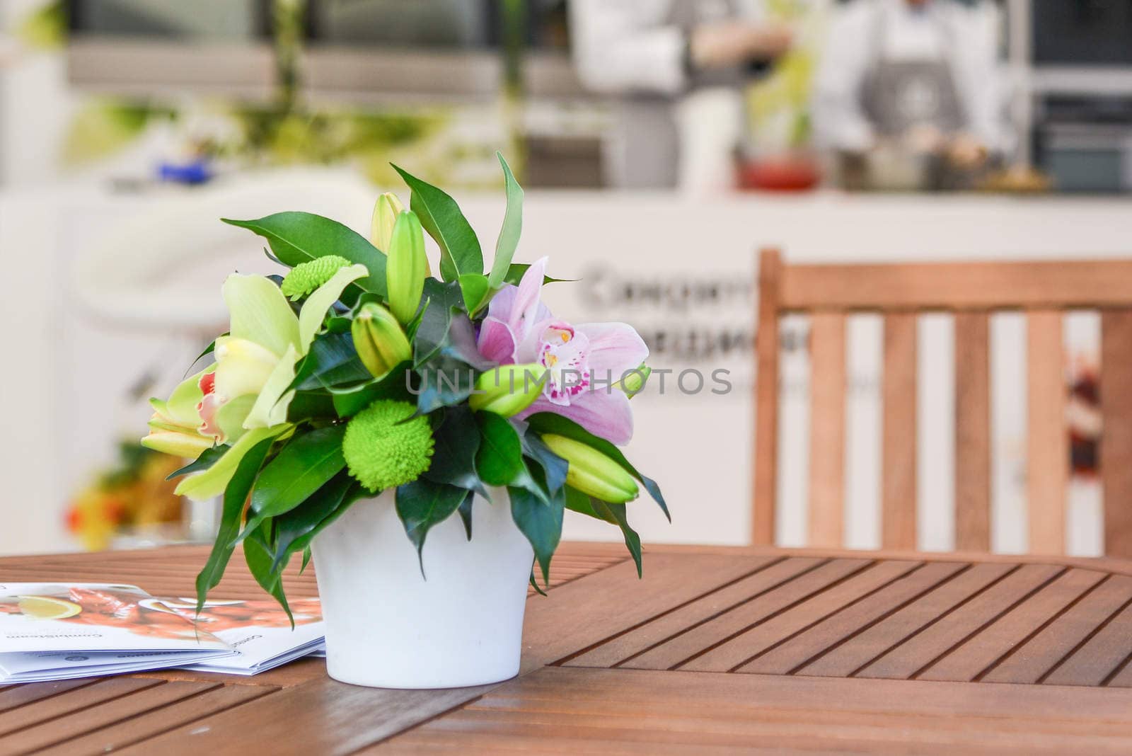 a small bouquet of flowers on the table