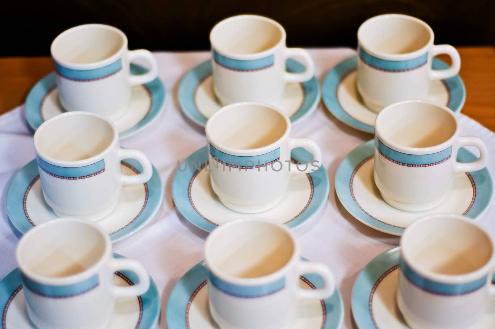 nine white porcelain tea cups and saucers and napkins by vlaru