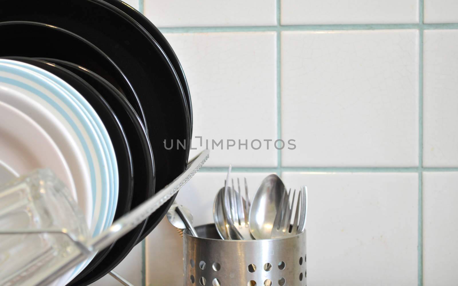 the clean dishes on the rack