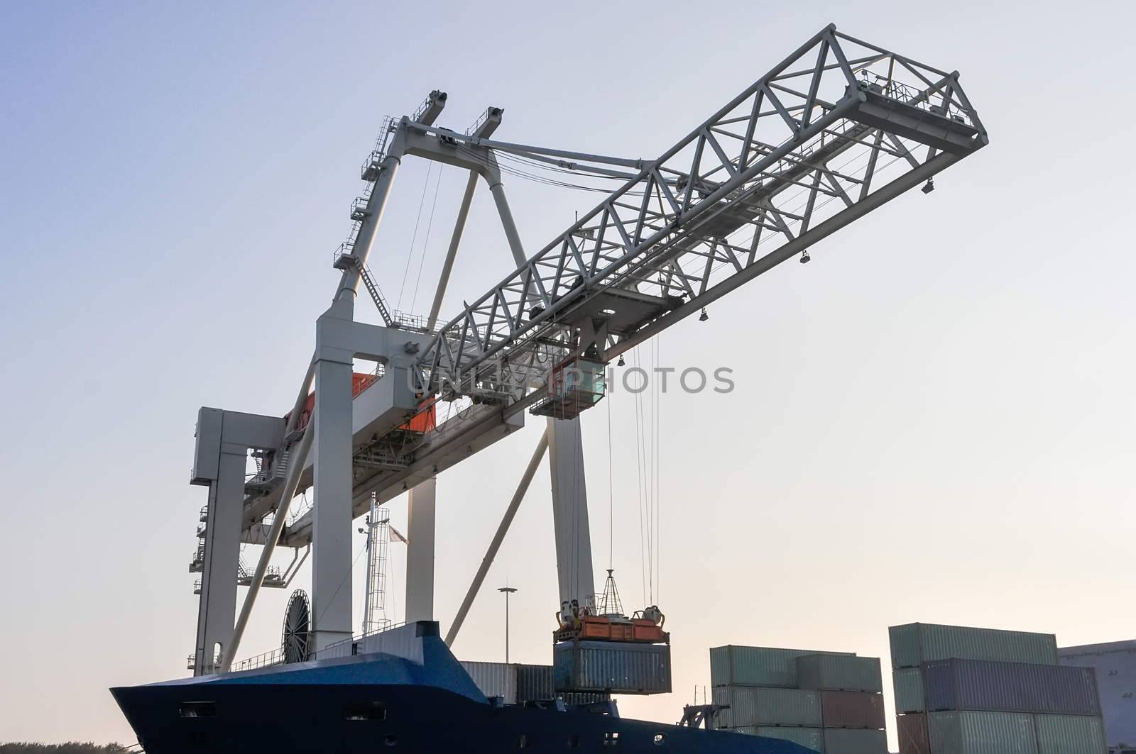 sea cargo port large cranes by vlaru